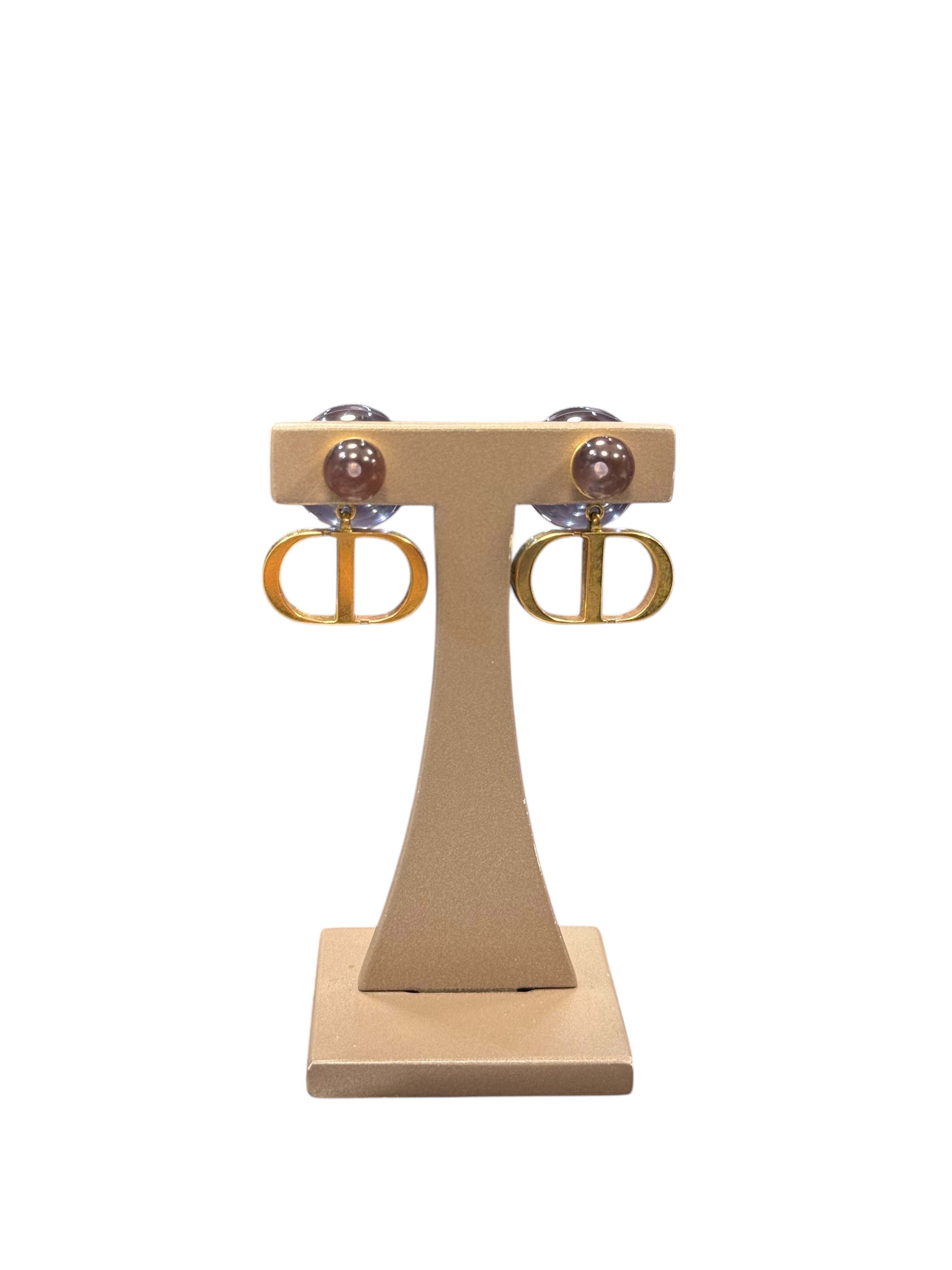 Dior - Boucles d’oreilles Tribales CD violet