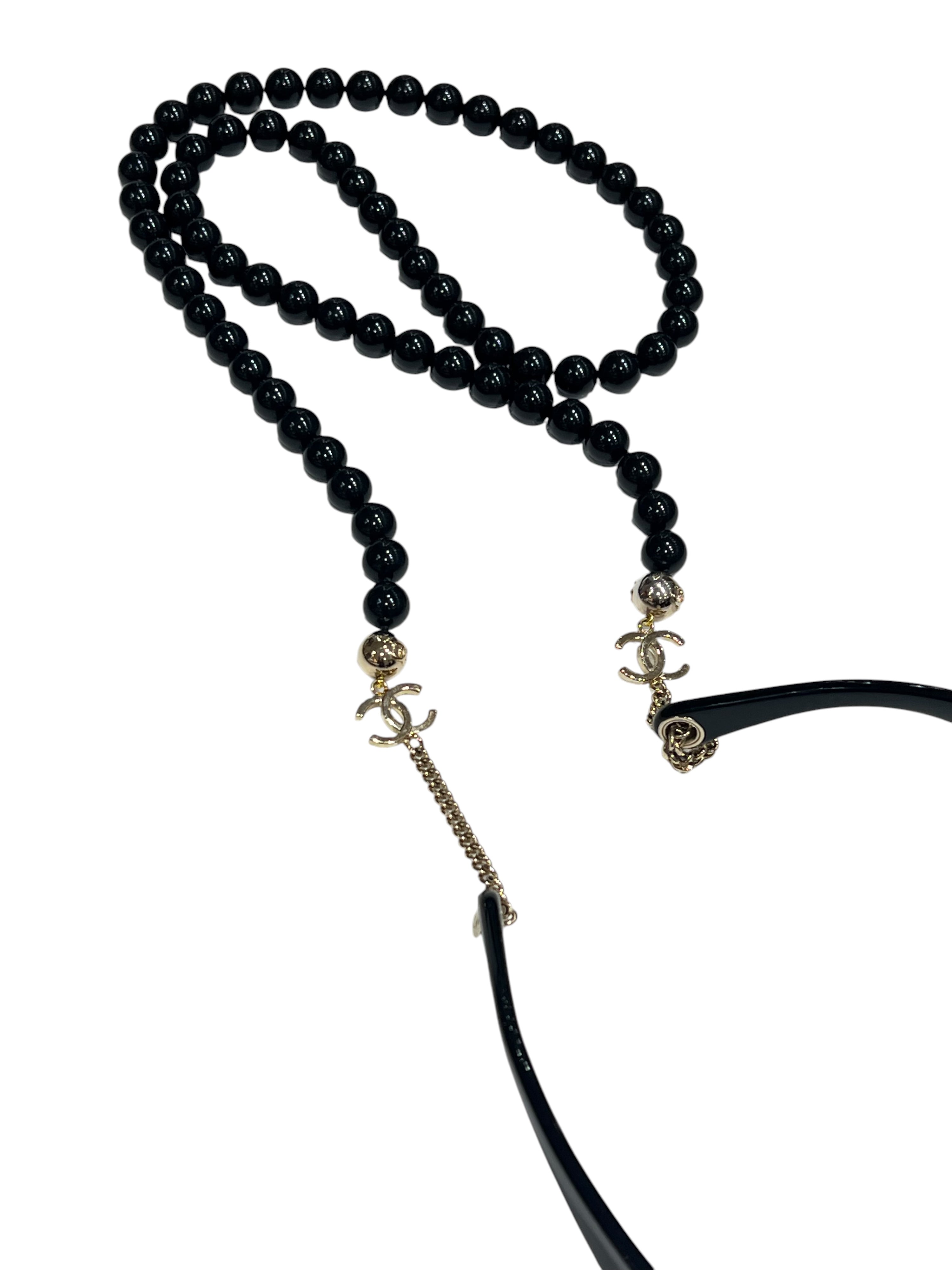 Chanel - solaires avec chaîne perlées noires