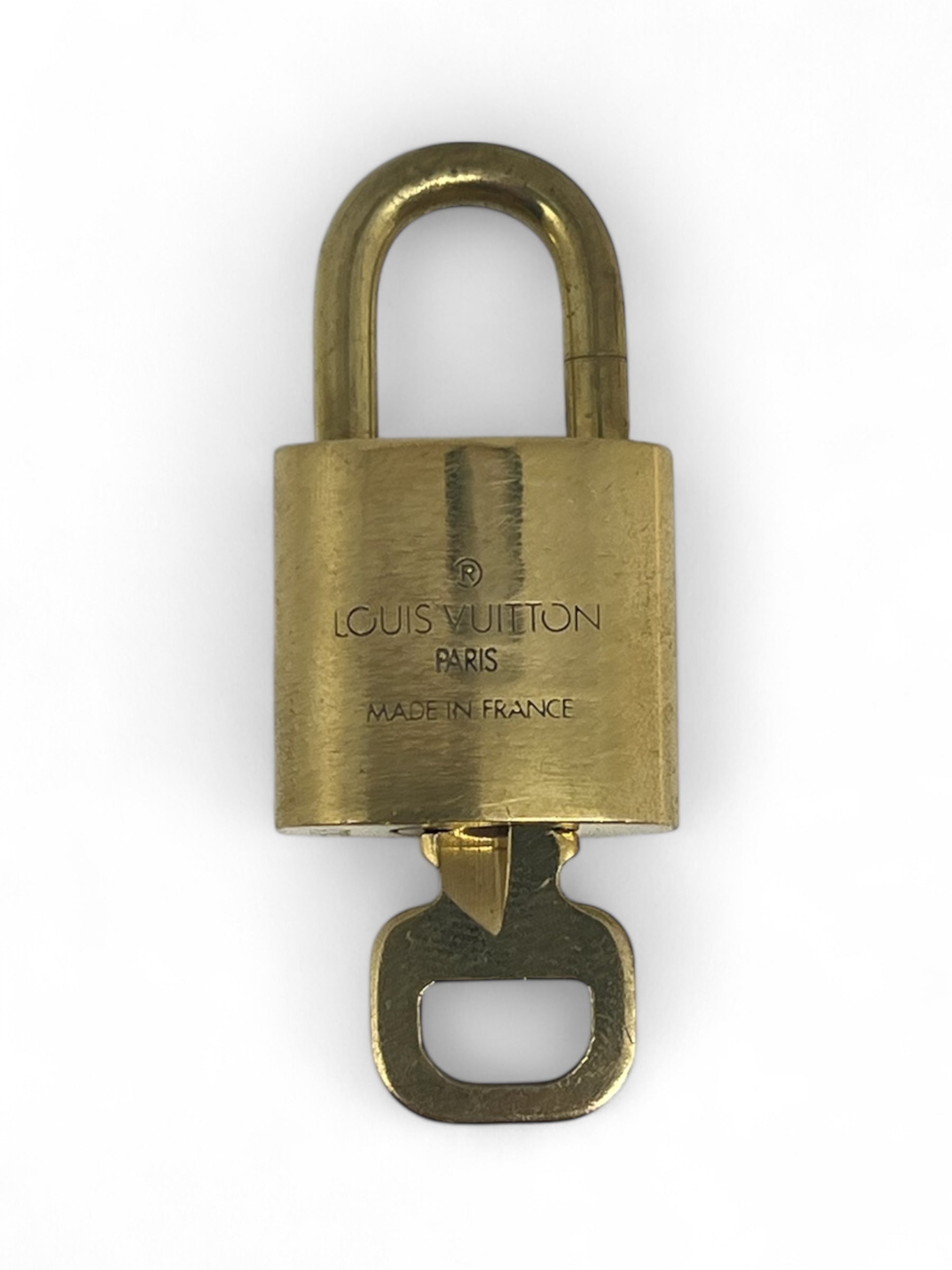 Louis Vuitton - Lucchetto LV placcato oro 303
