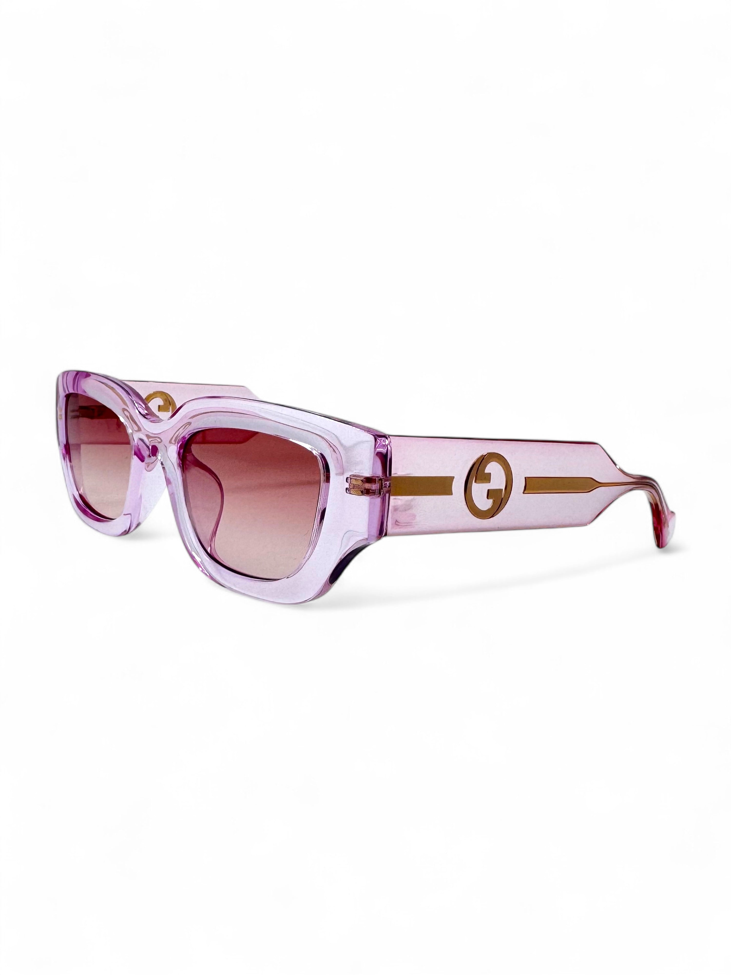 Gucci - Durchsichtige rosafarbene Sonnenbrille