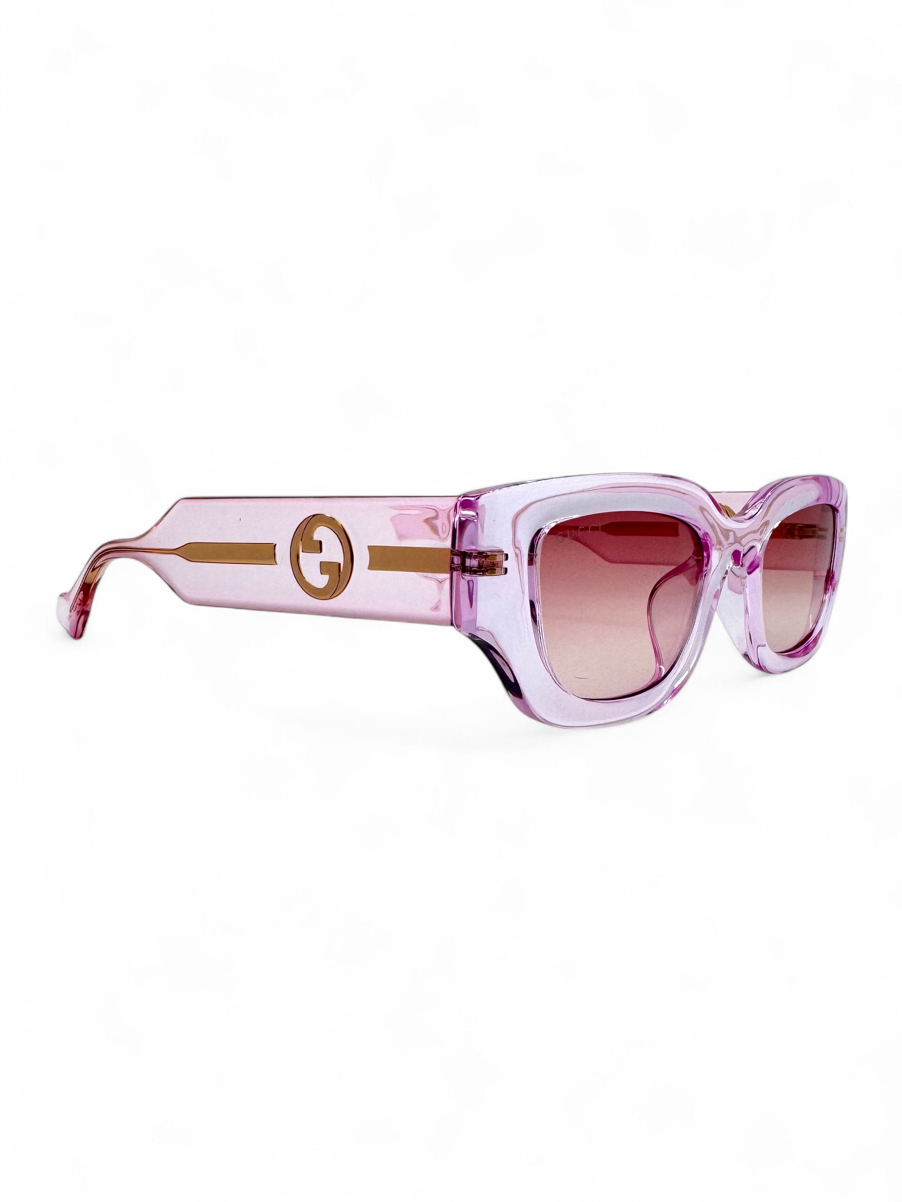 Gucci - Lunettes de soleil rose en transparence