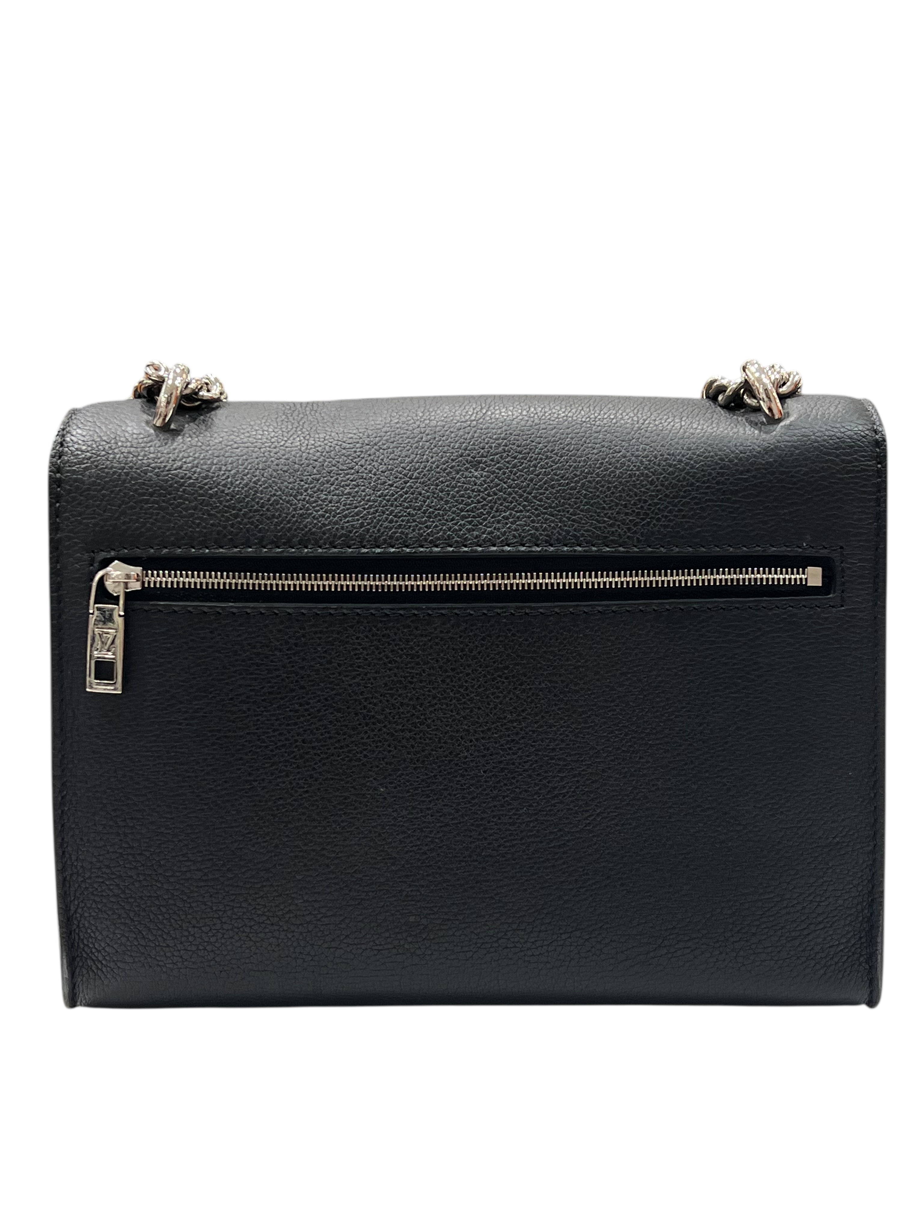 Louis Vuitton - Sac Lock Me en cuir noir et finition argenté