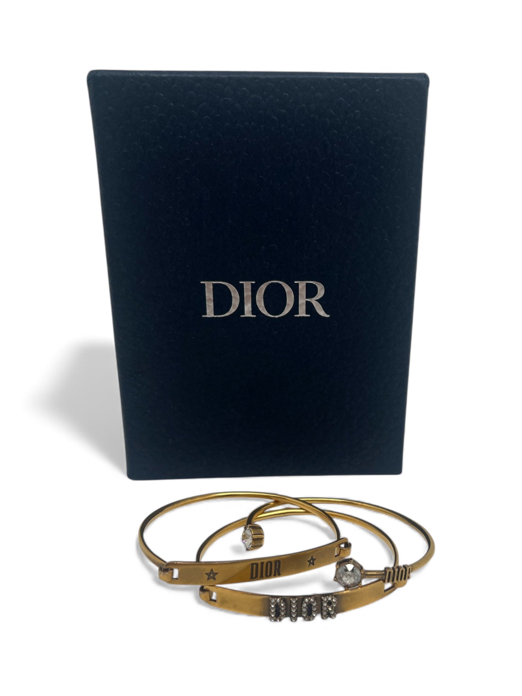 Dior - Set aus 3 goldfarbenen Armbändern Dio(r)evolution