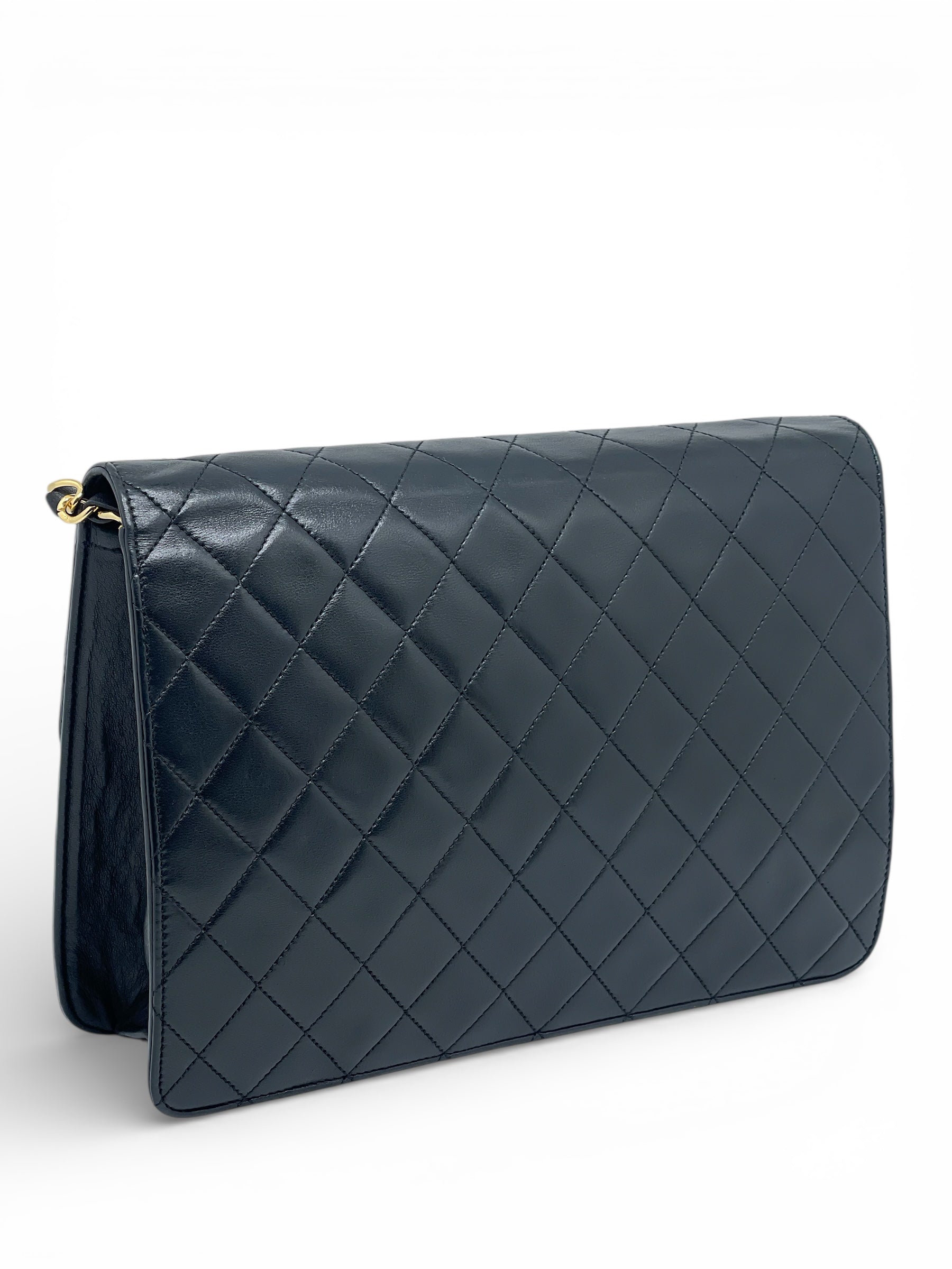 Chanel - Sac à rabat en cuir noir