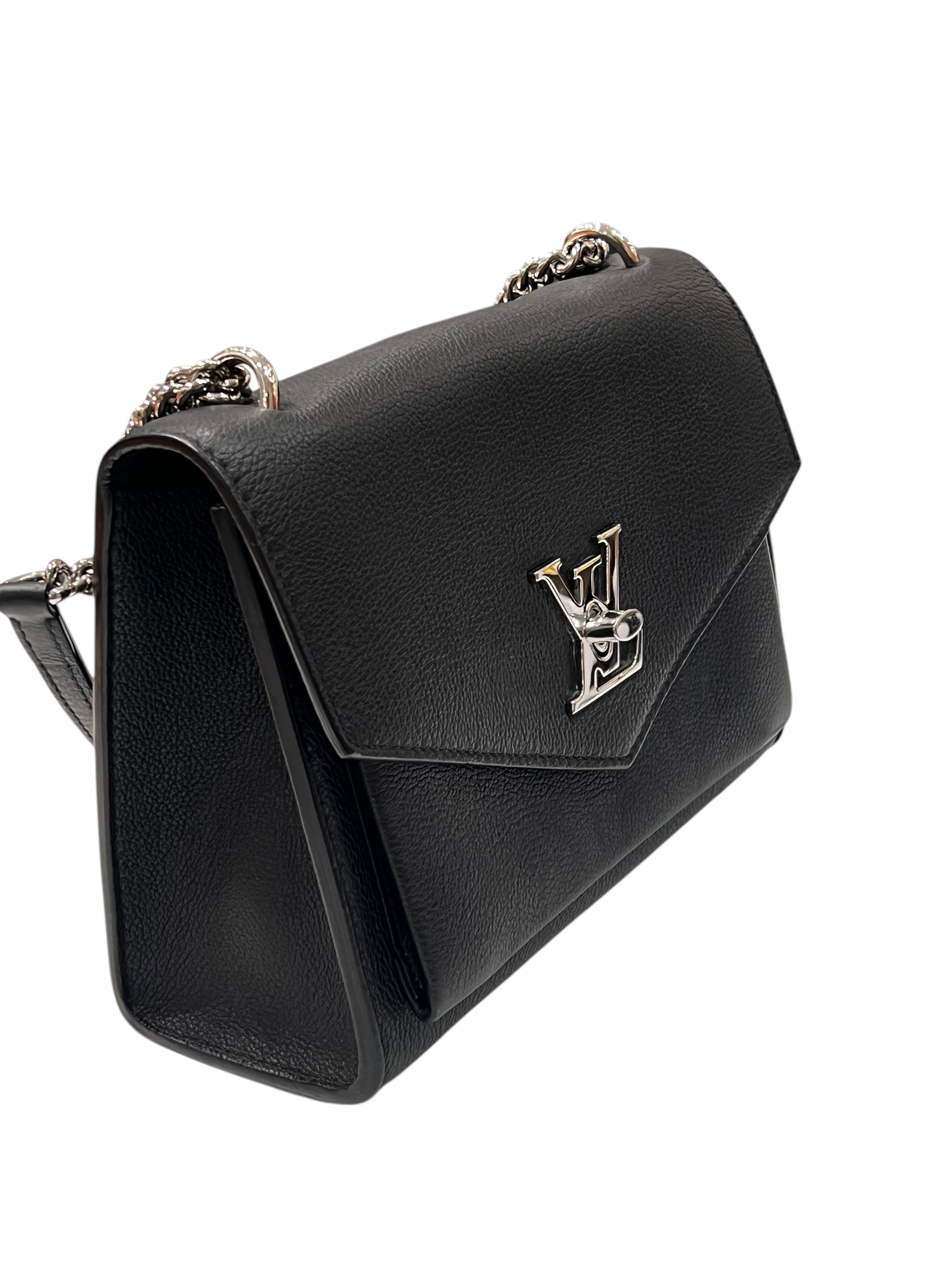 Louis Vuitton - Sac Lock Me en cuir noir et finition argenté