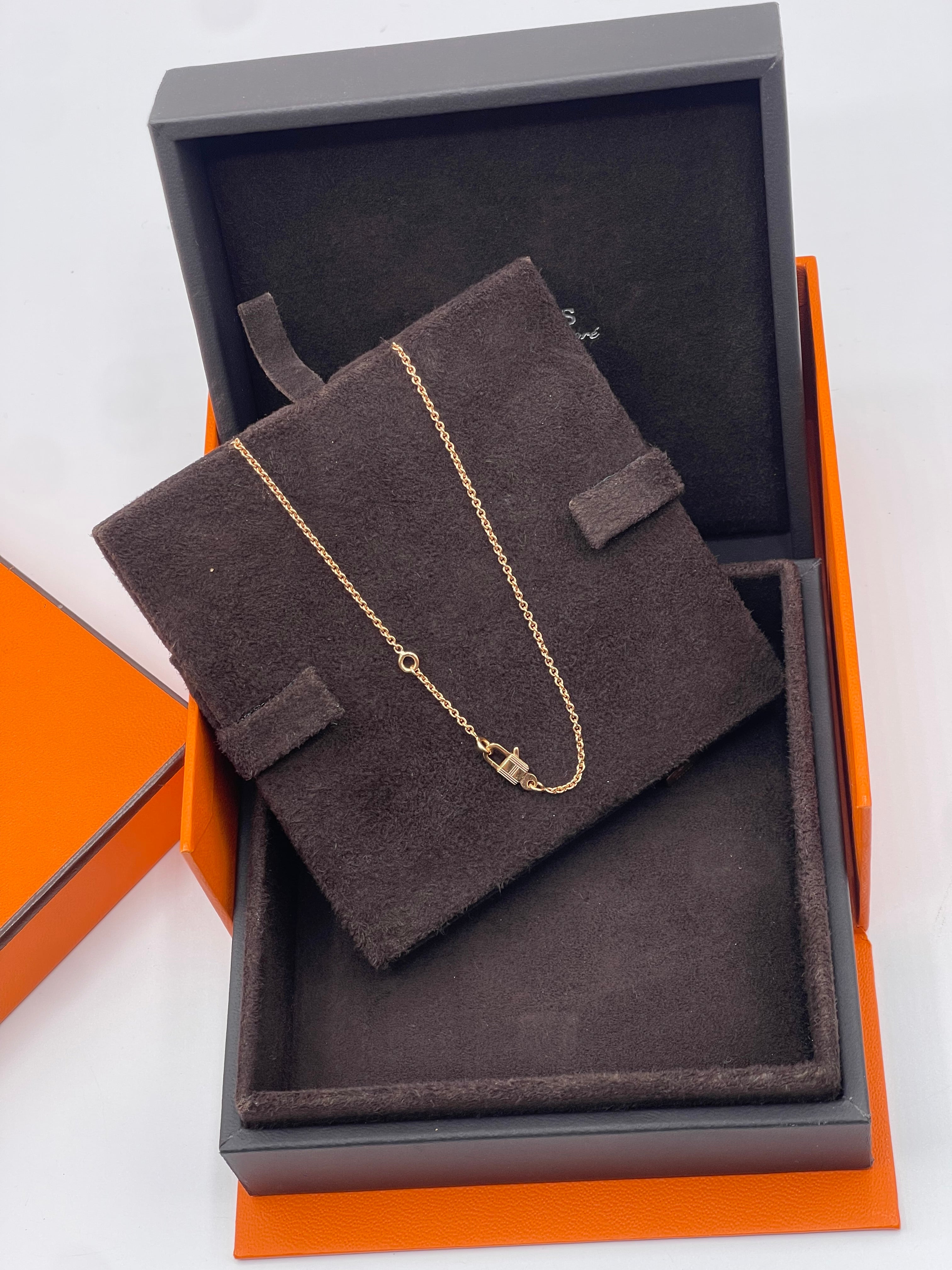 Hermès - Kelly padlock pendant in pink gold and diamonds