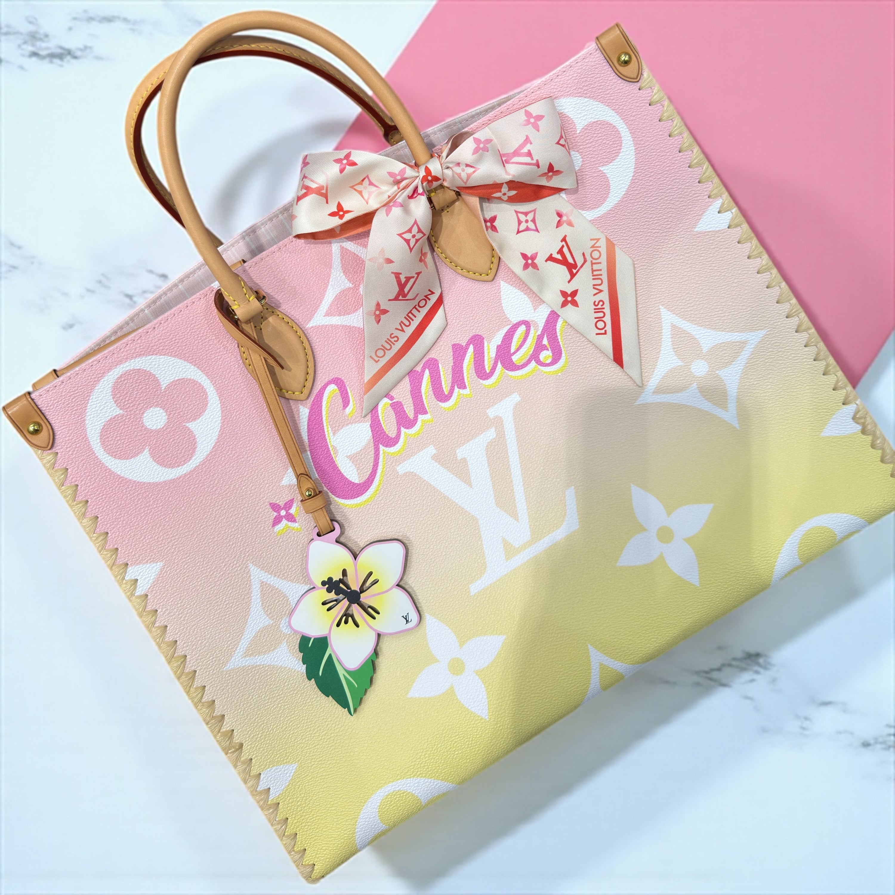 Louis Vuitton - Tasche On The Go GM Cannes-Ausgabe aus Monogramm-Leinen in Rosa- und Gelbverlauf
