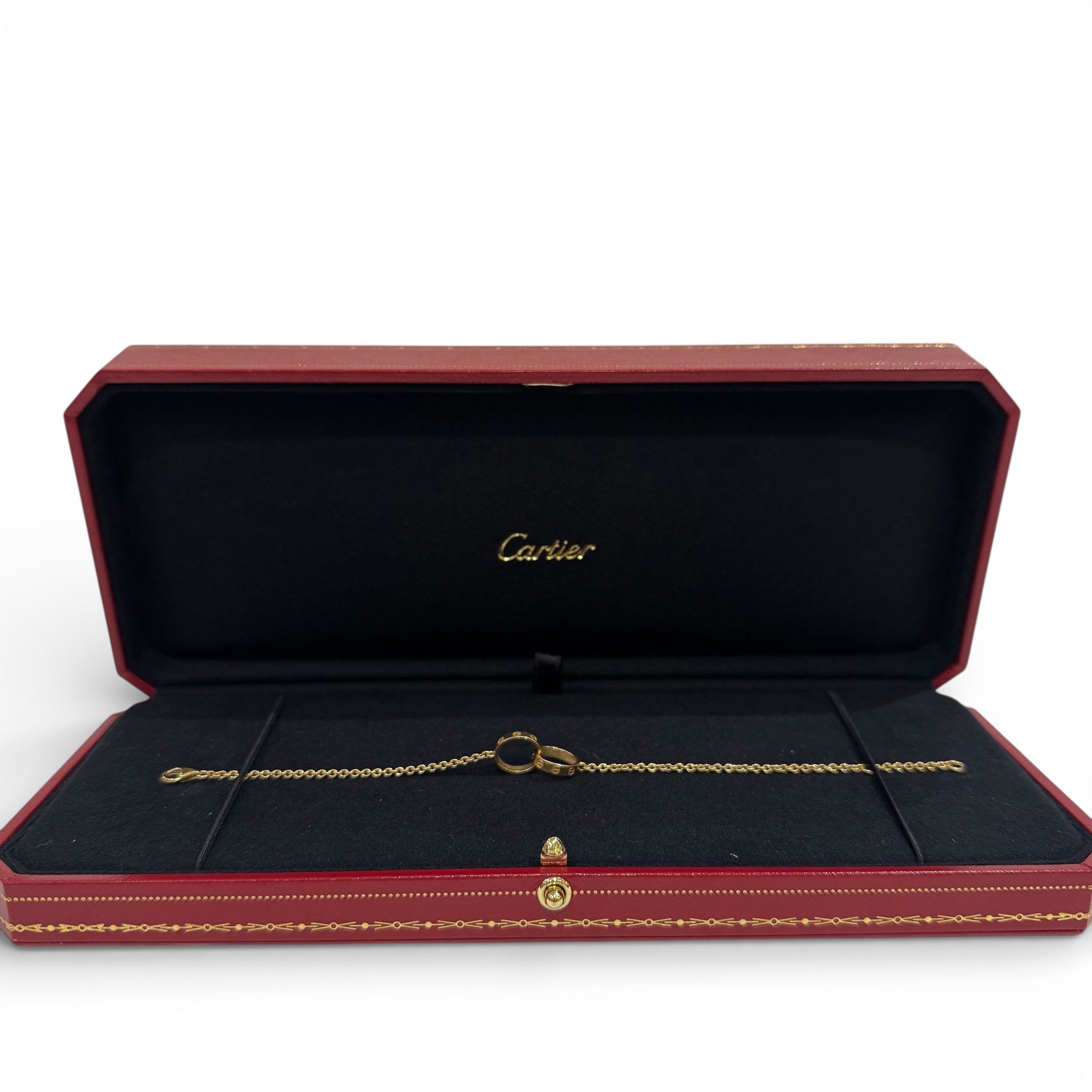 Cartier - Interlocking Love bracelet in yellow gold