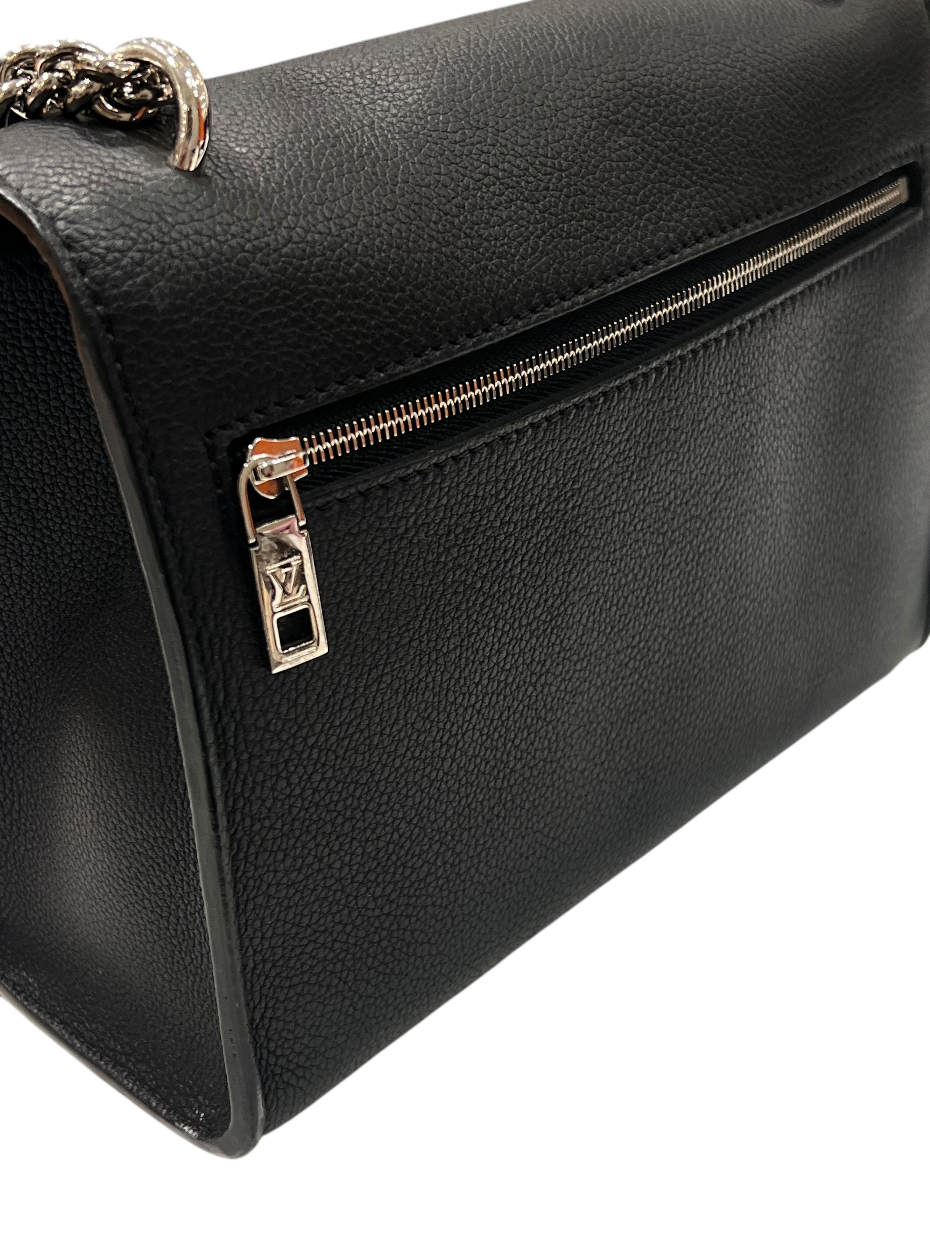 Louis Vuitton - Sac Lock Me en cuir noir et finition argenté