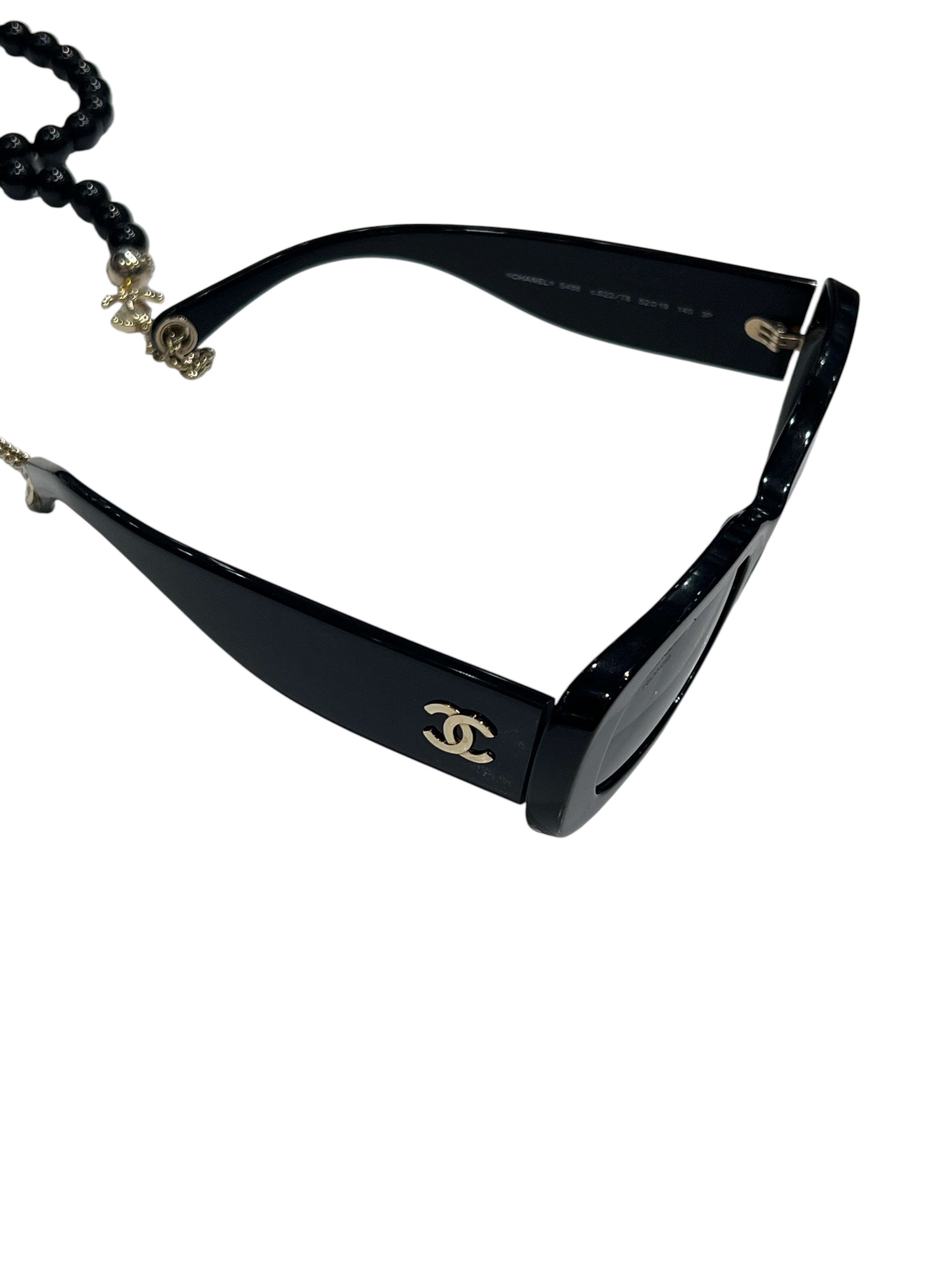 Chanel - solaires avec chaîne perlées noires