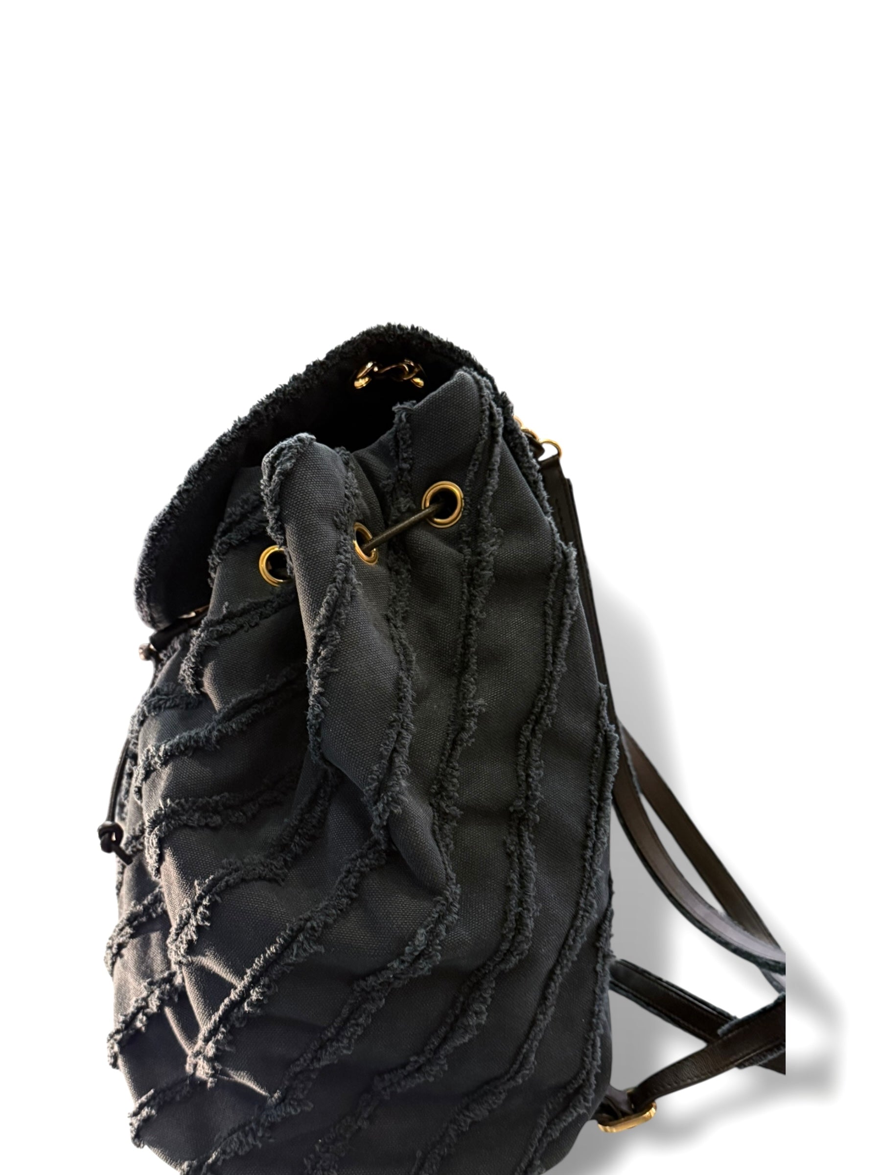 Chanel - Sac à dos moyen modèle en tissus effrangé