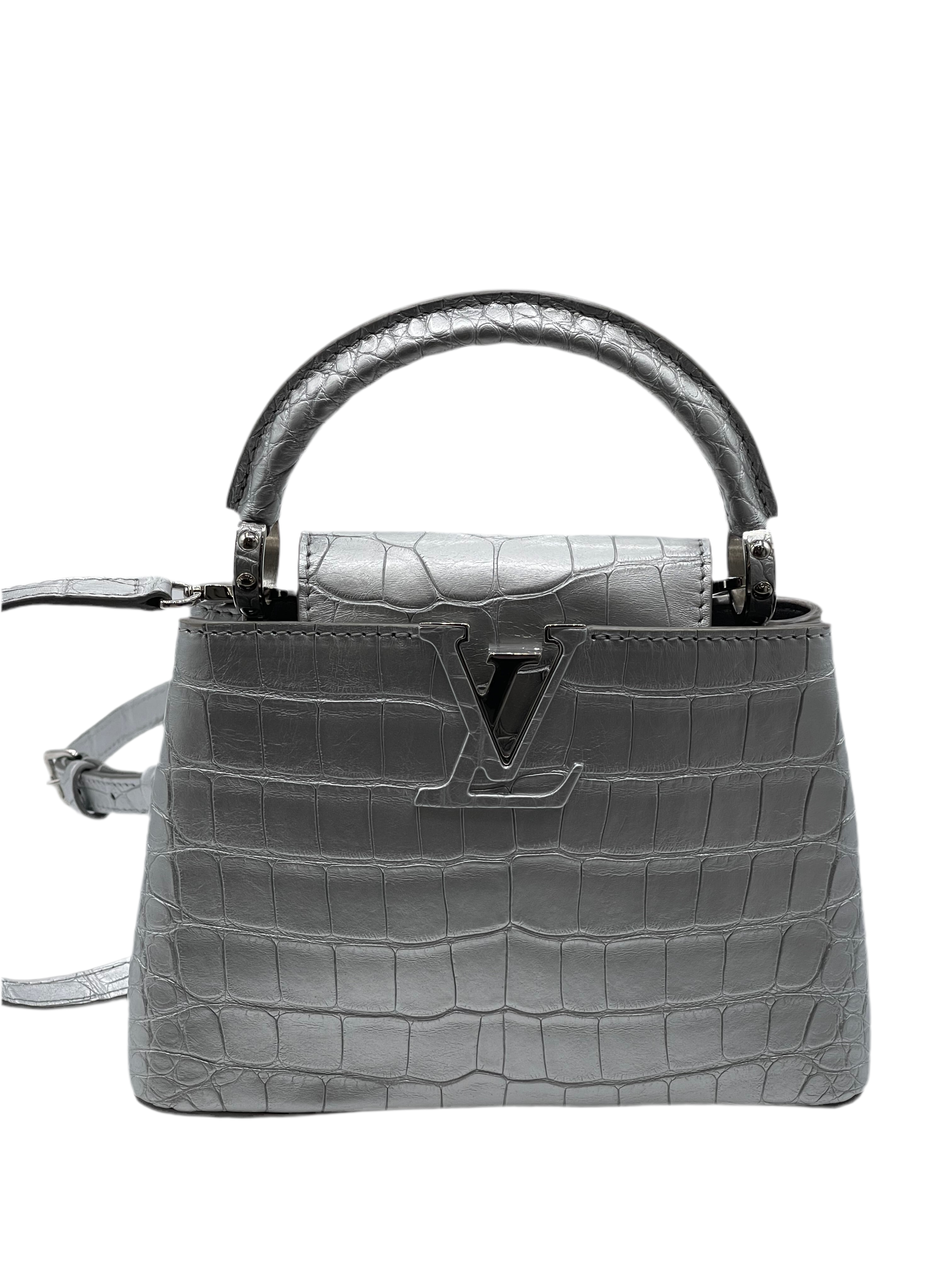 Louis Vuitton - Sac Capucines alligator Silver