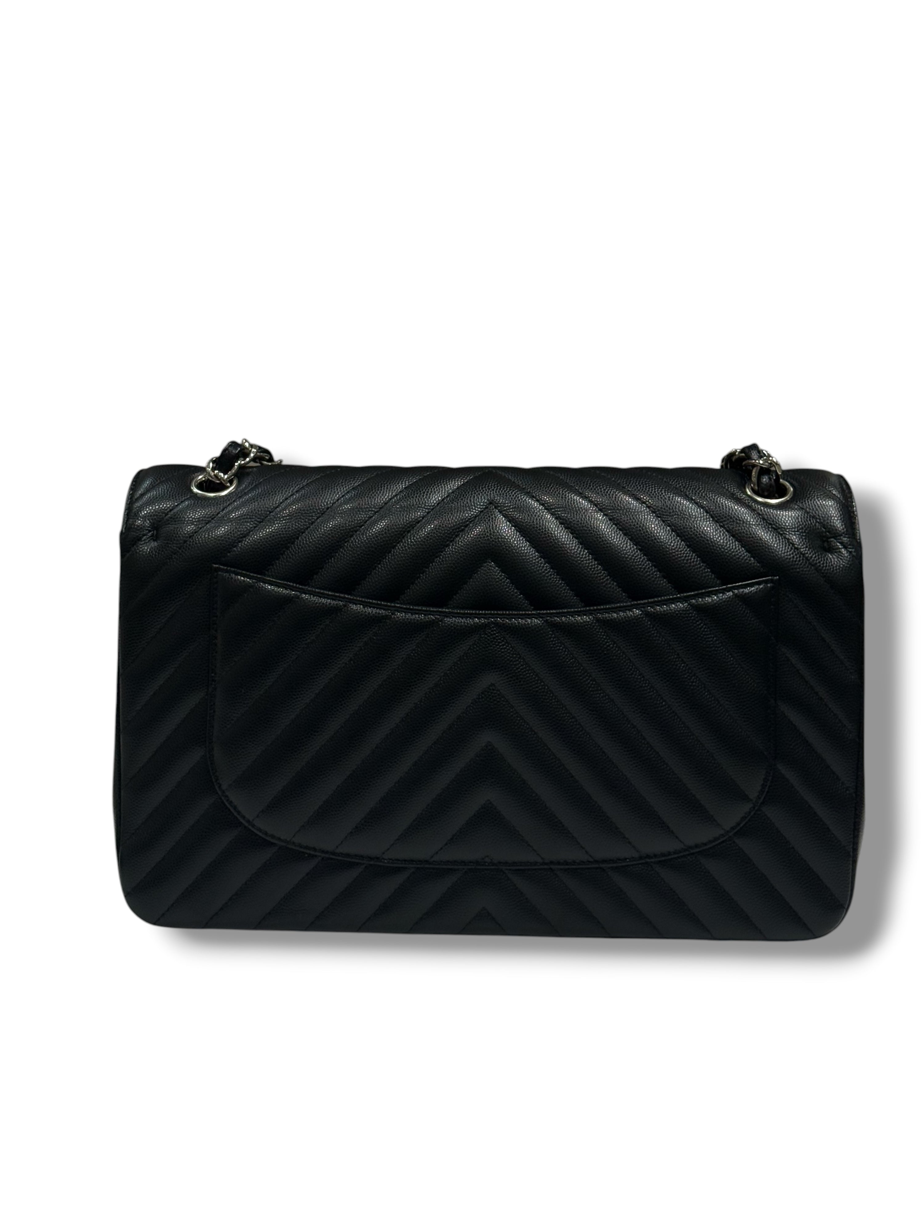 Chanel - Sac Jumbo noir cuir caviar chevron