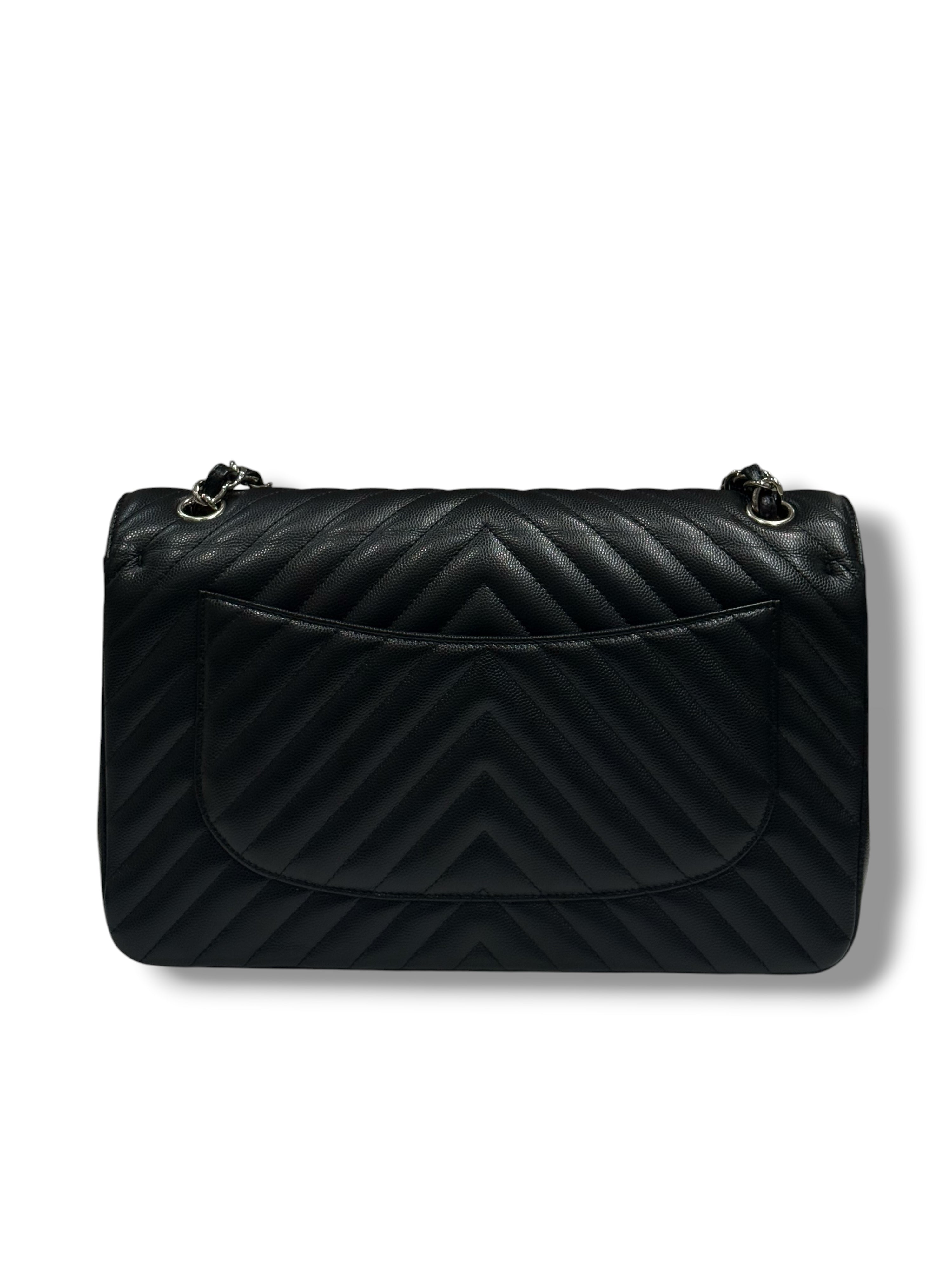 Chanel - Sac Jumbo noir cuir caviar chevron