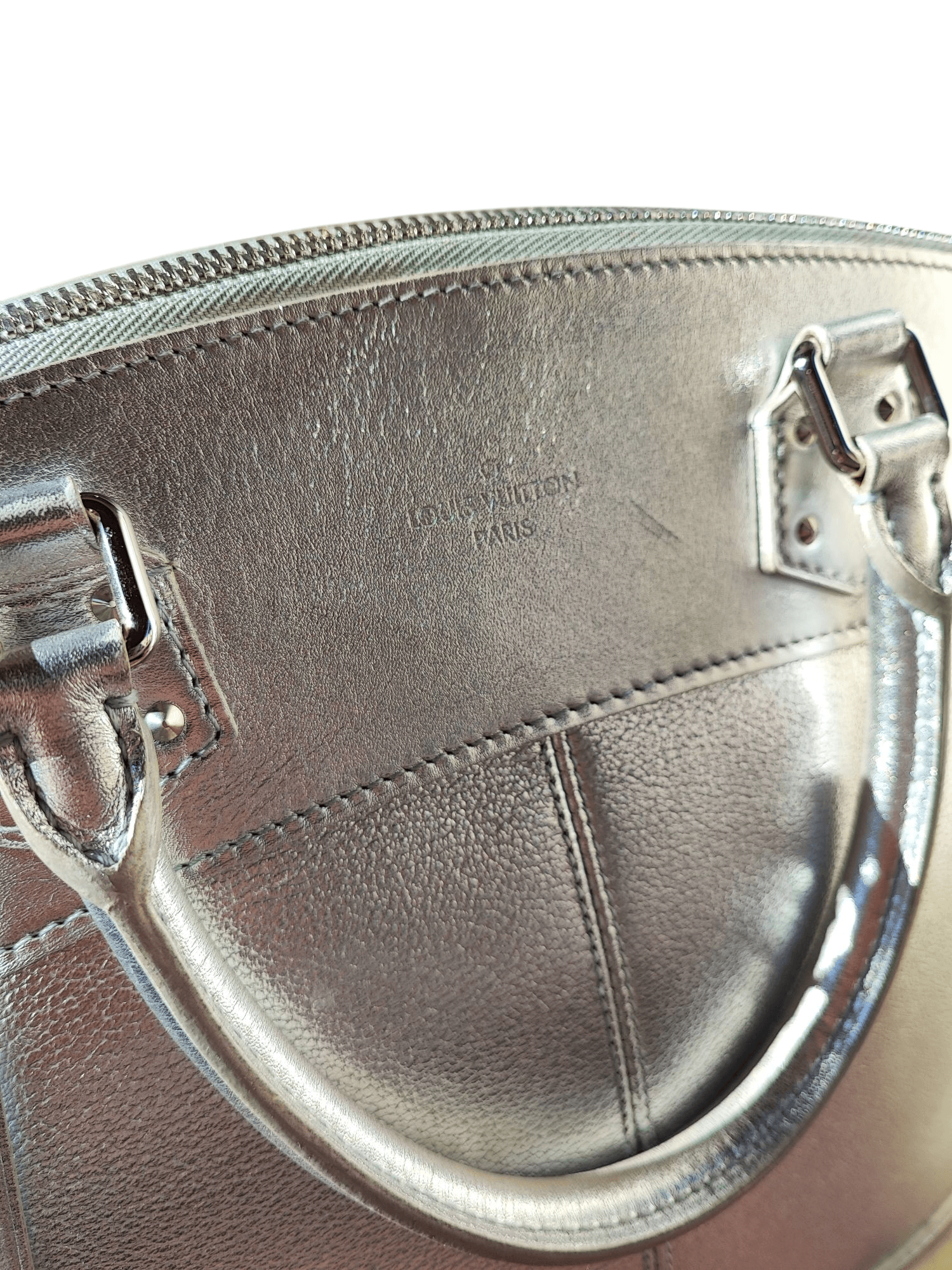 Louis Vuitton - Sac Suhali Lockit argenté