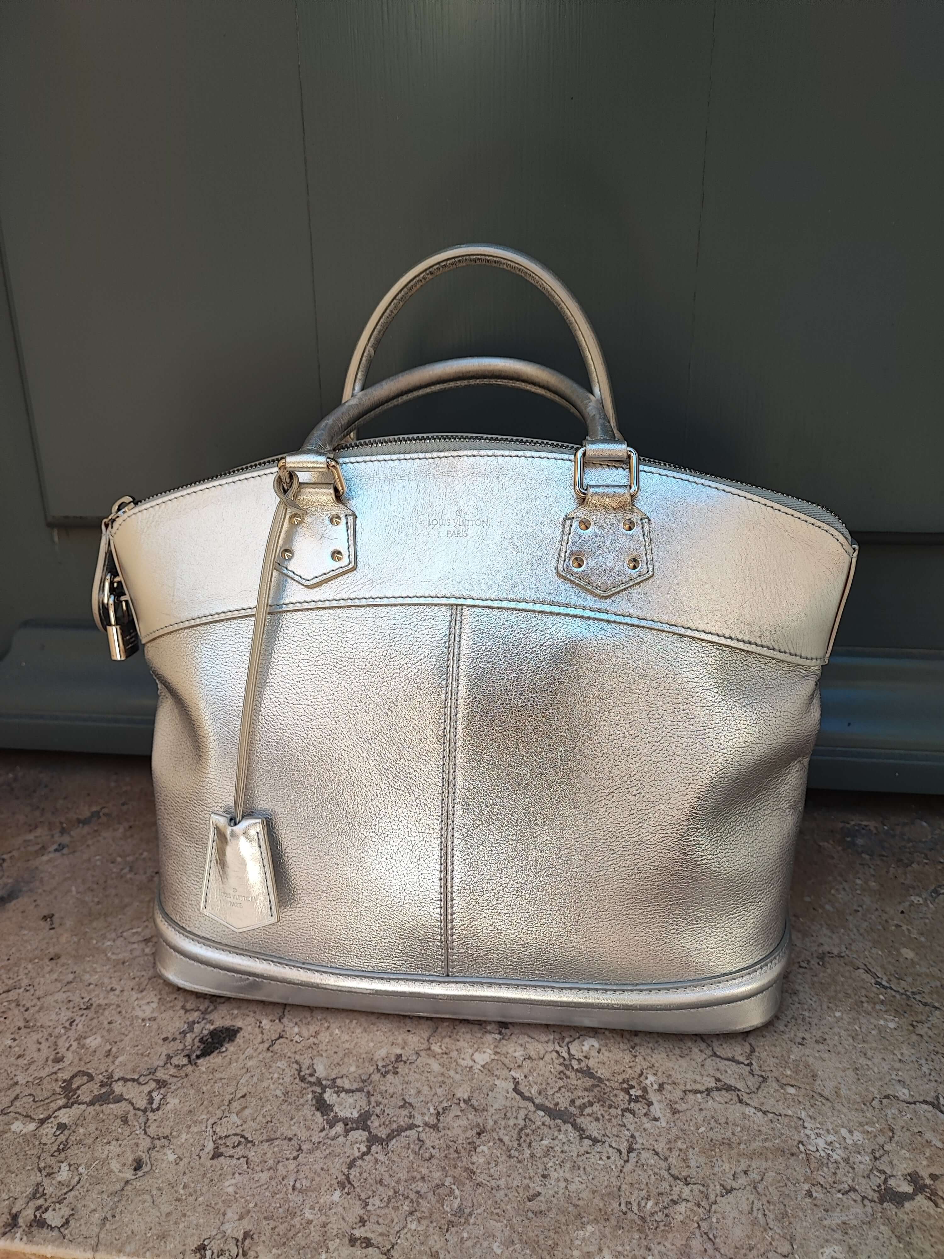 Louis Vuitton - Sac Suhali Lockit argenté