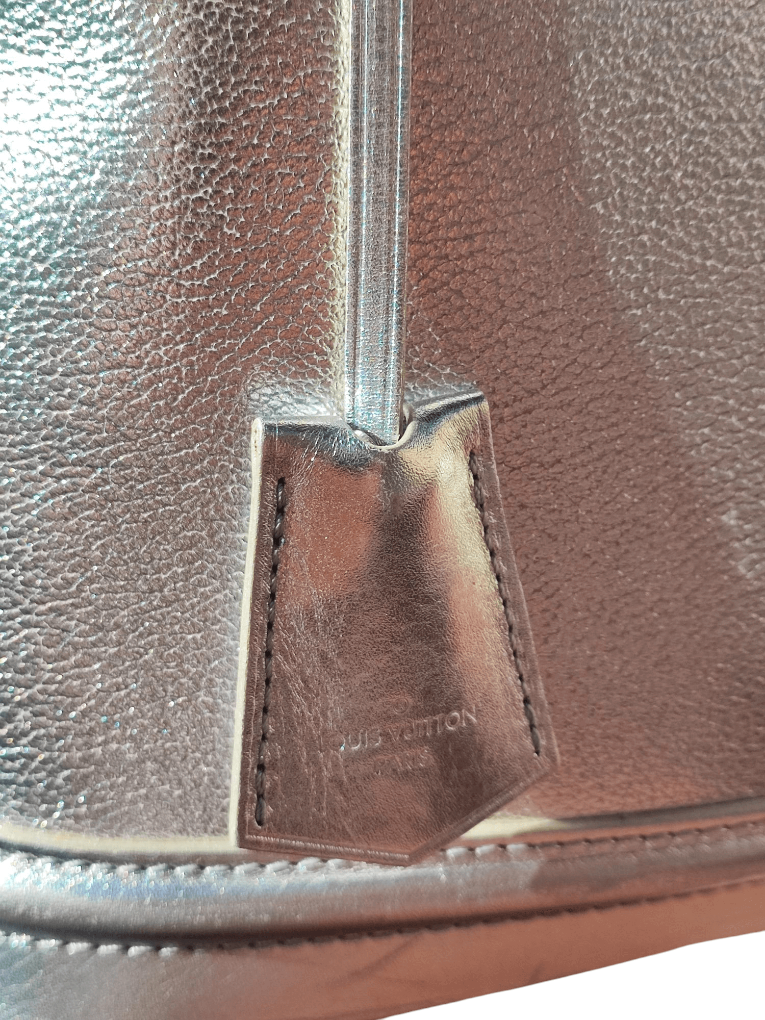 Louis Vuitton - Sac Suhali Lockit argenté