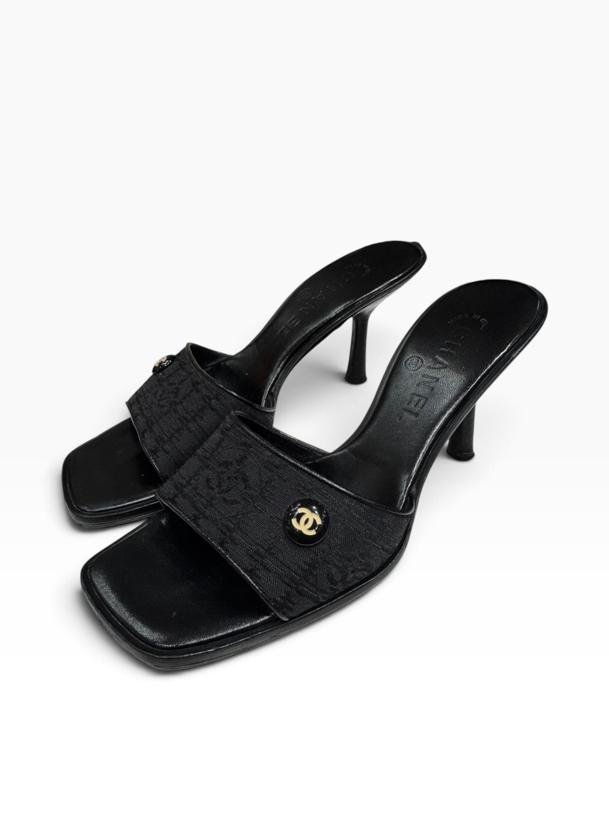 Chanel - Mules à talon en cuir noir et toile