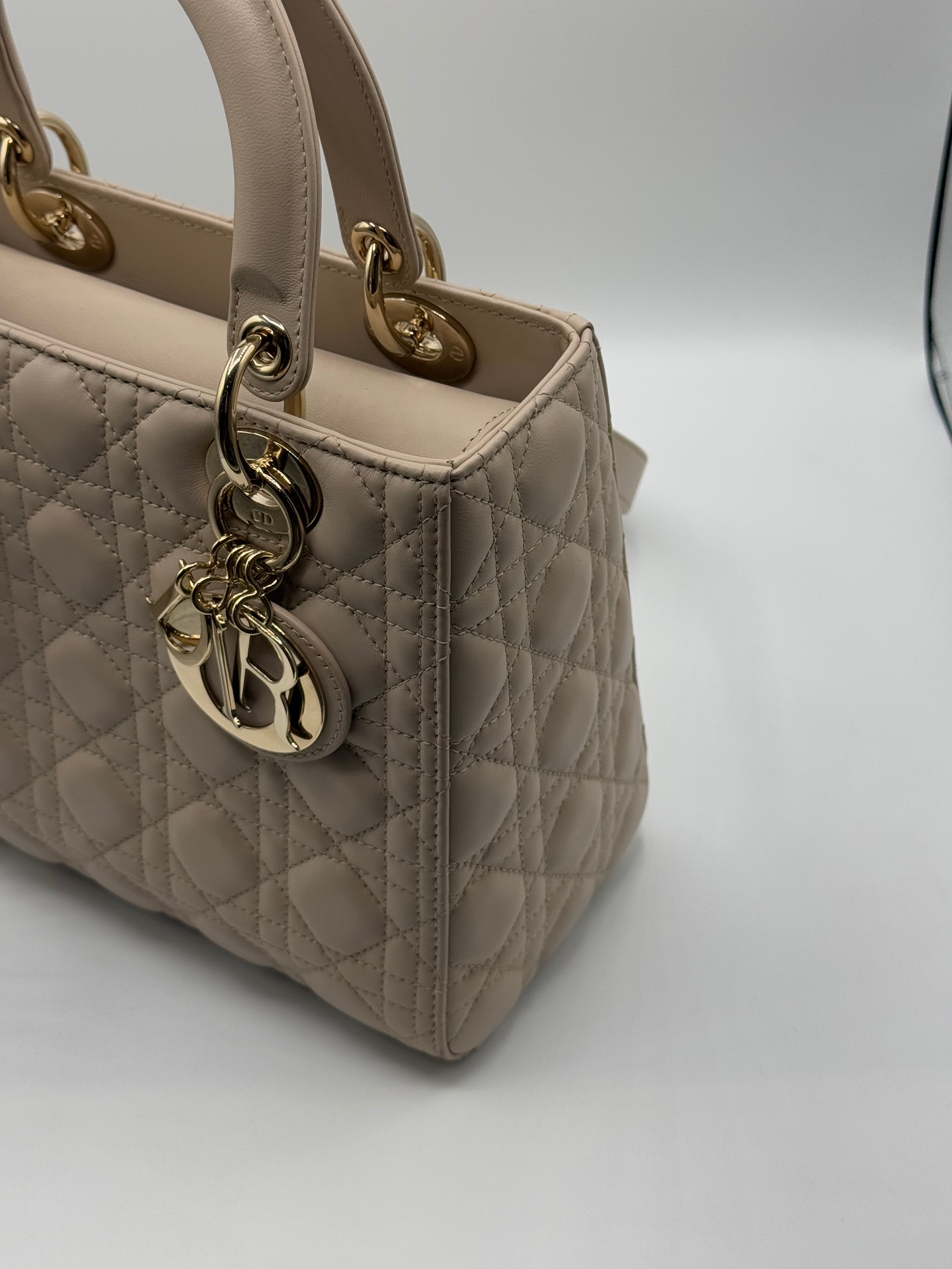 Dior - Medium Lady Dior bag in beige leather