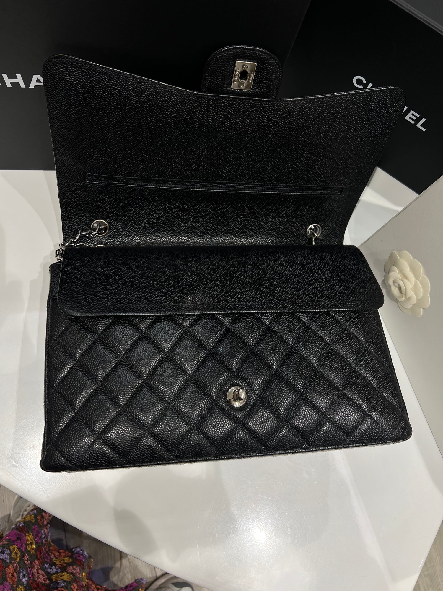 Chanel - classic maxi jumbo black caviar leather bag