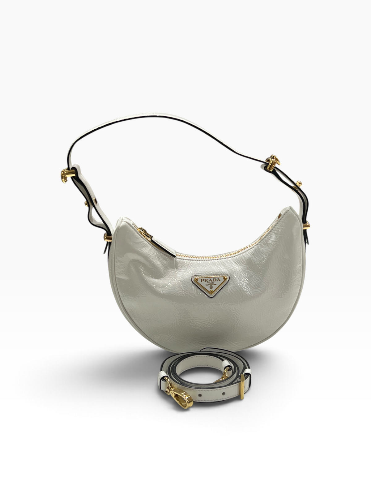 PRADA - Sac Arqué en cuir vernis blanc