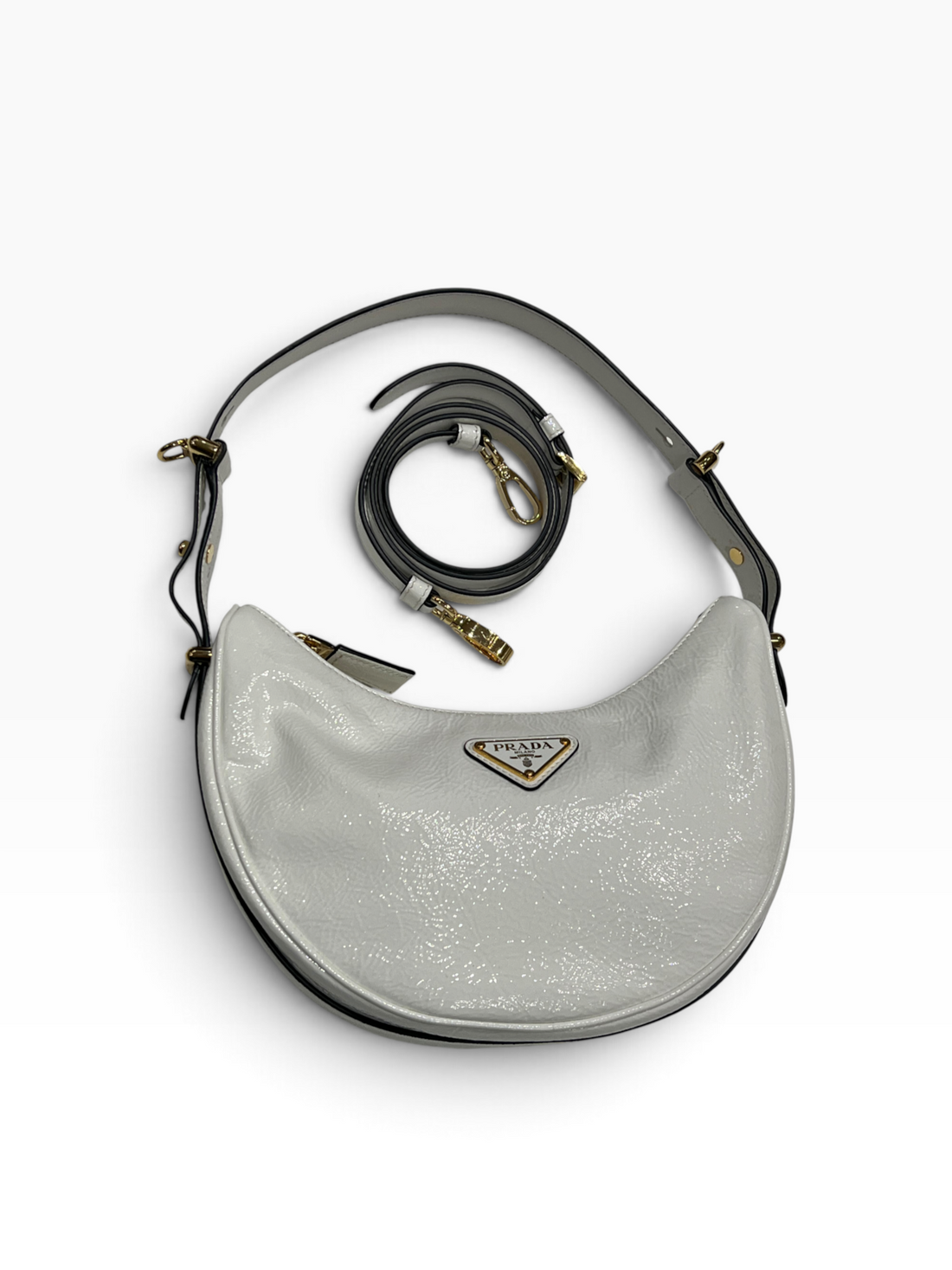PRADA - Sac Arqué en cuir vernis blanc