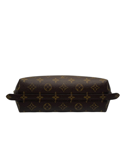 Louis Vuitton - pochette maquillage Toile monogramme GM