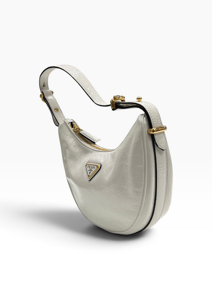 PRADA - Sac Arqué en cuir vernis blanc