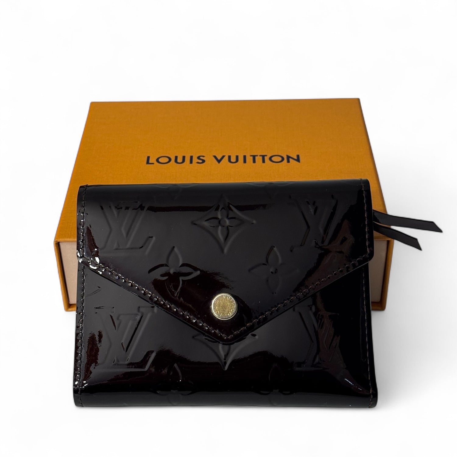 Louis Vuitton - Porte-monnaie en cuir vernis