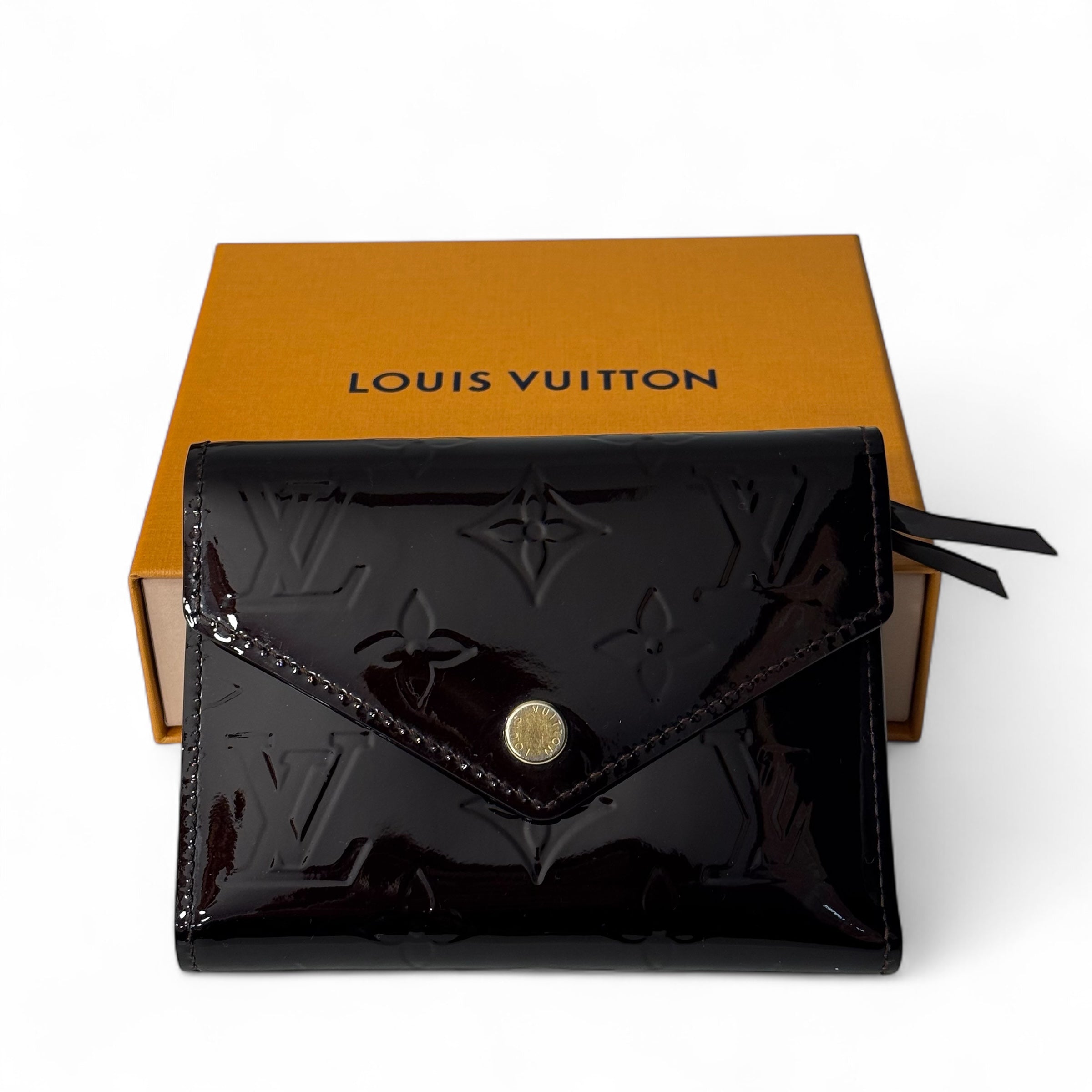 Louis Vuitton - Porte-monnaie en cuir vernis