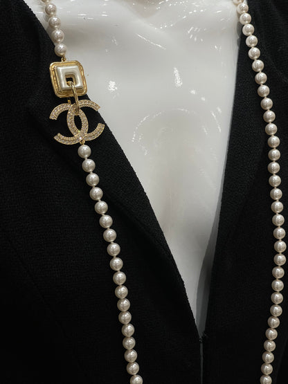 Chanel - Sautoir perles CC