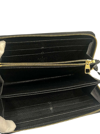 Louis Vuitton - sac petit palais cuir emprunte noir