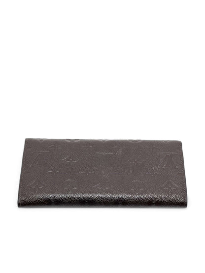 Louis Vuitton - Geldbörse Sarah aus geprägtem Monogramm-Leder