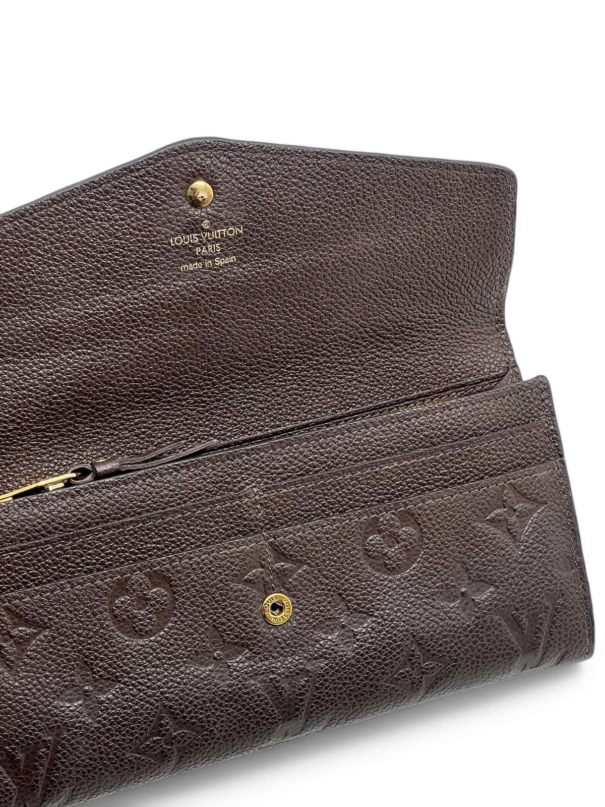 Louis Vuitton - Geldbörse Sarah aus geprägtem Monogramm-Leder