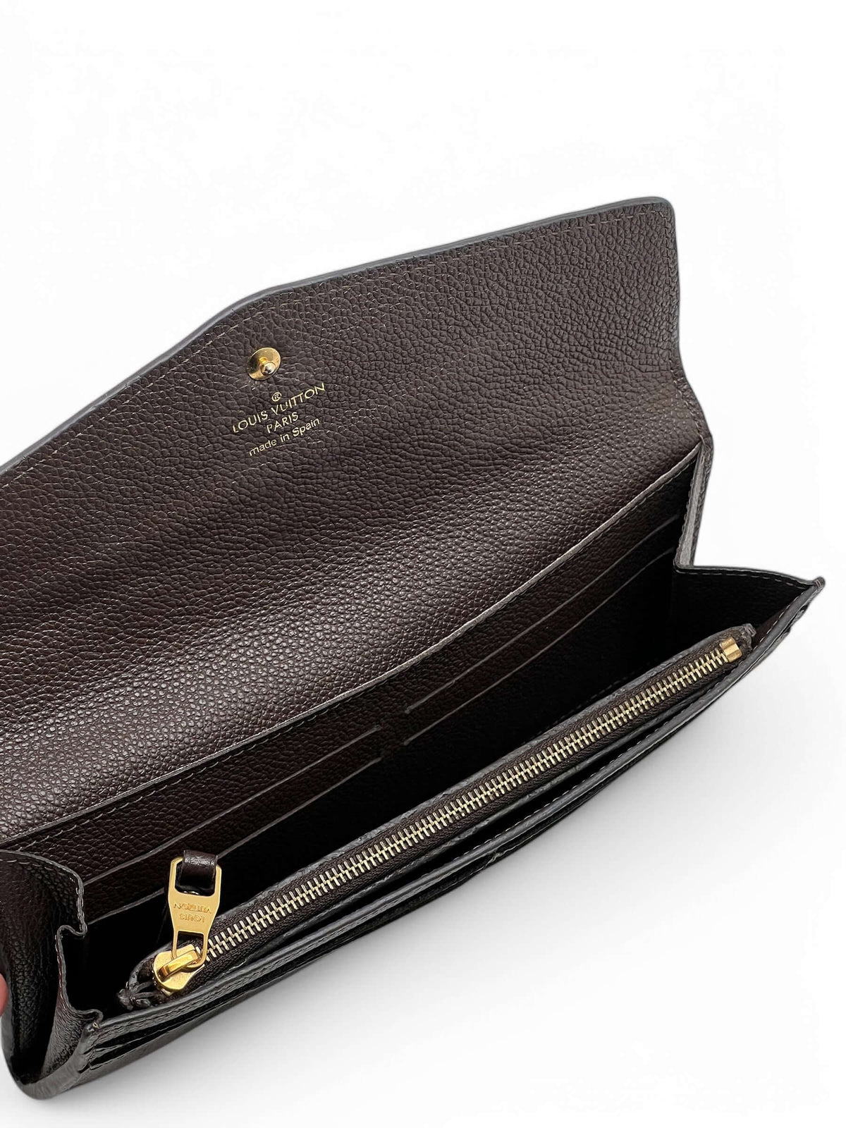 Louis Vuitton - Geldbörse Sarah aus geprägtem Monogramm-Leder