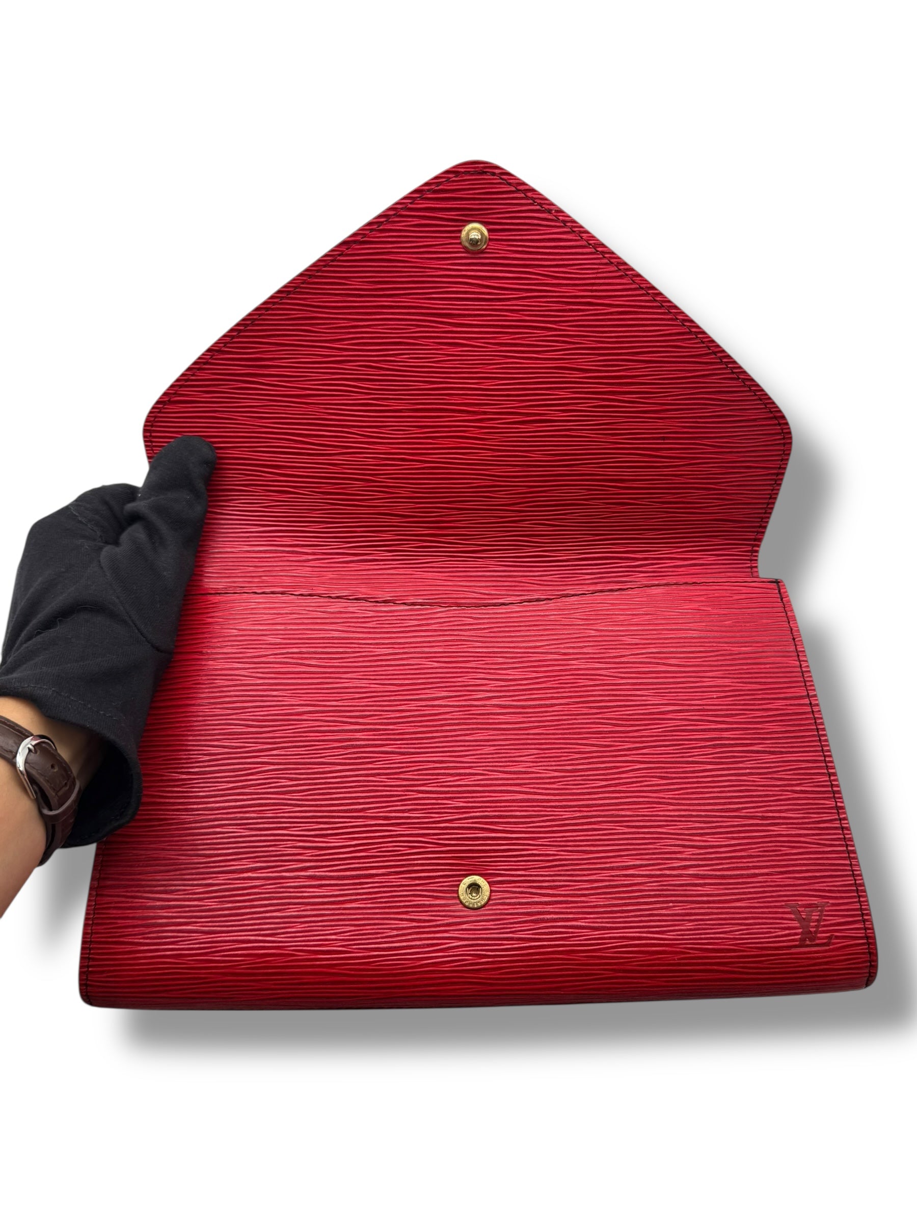 Louis Vuitton - Pochette cuir épi rouge