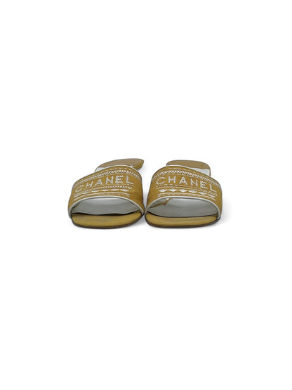 Chanel - Mules con tacco gialle T38