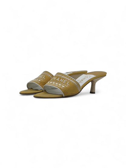 Chanel - Mules con tacco gialle T38