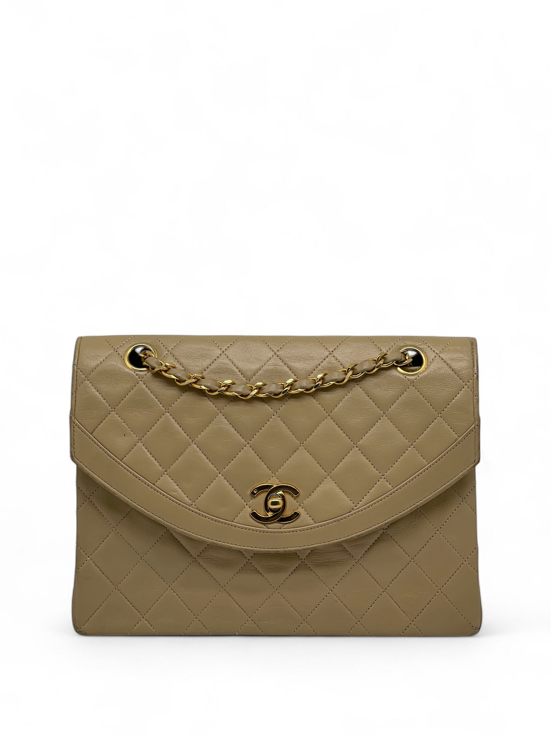 Chanel - Sac matelassé beige