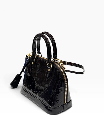 Louis Vuitton - sac bb Alma cuir vernis amarante