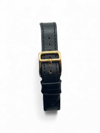 Hermès - Montre Kelly plaqué or et cuir noir