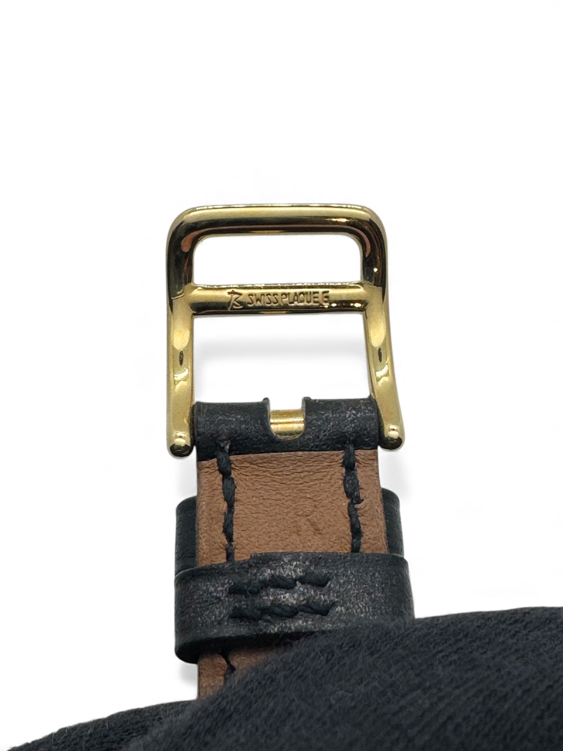 Hermès - Montre Kelly plaqué or et cuir noir