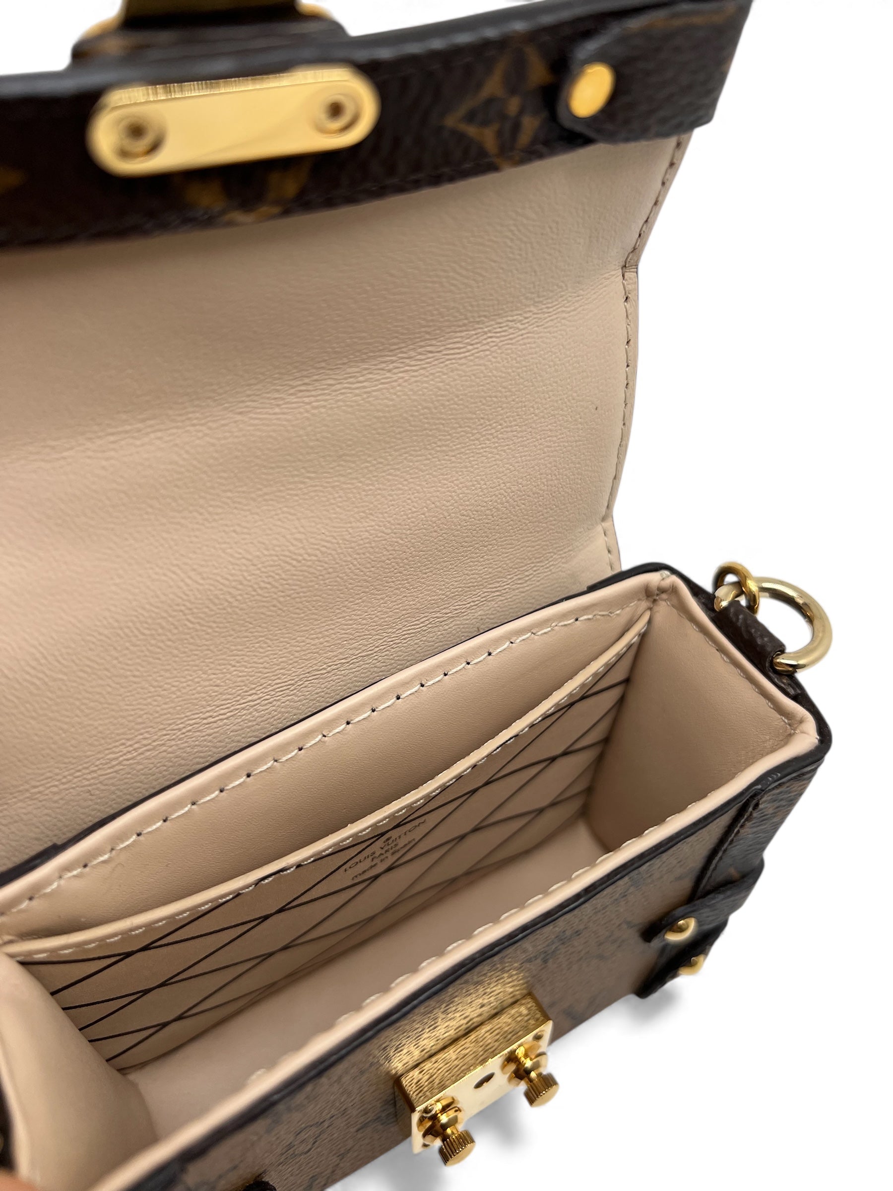 Louis Vuitton - Petite Malle Essential trunk with chain