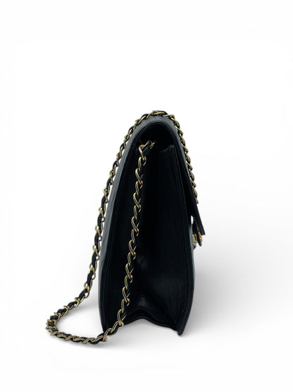 Chanel - Sac à rabat Classique en cuir noir