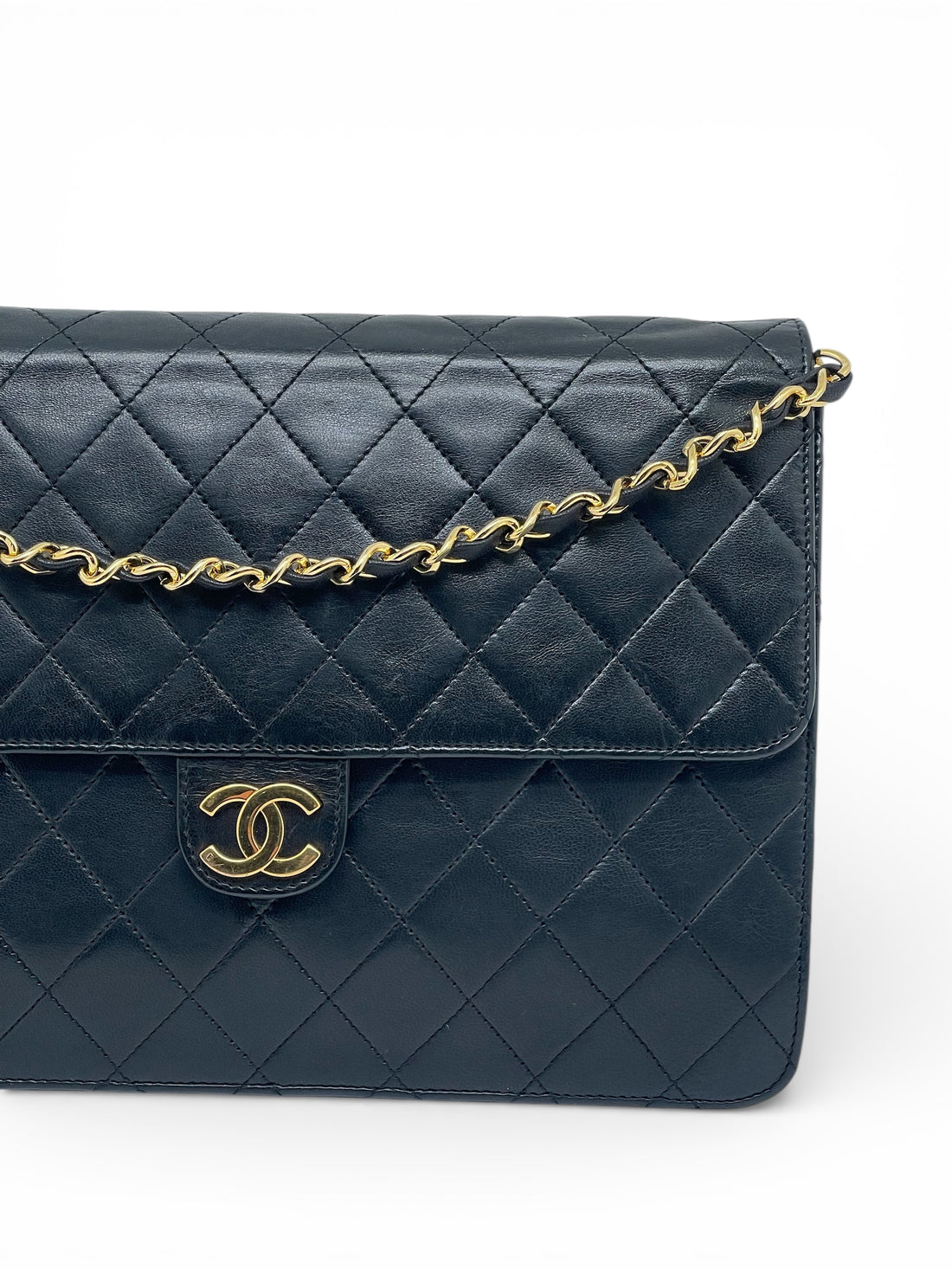 Chanel - Sac à rabat en cuir noir