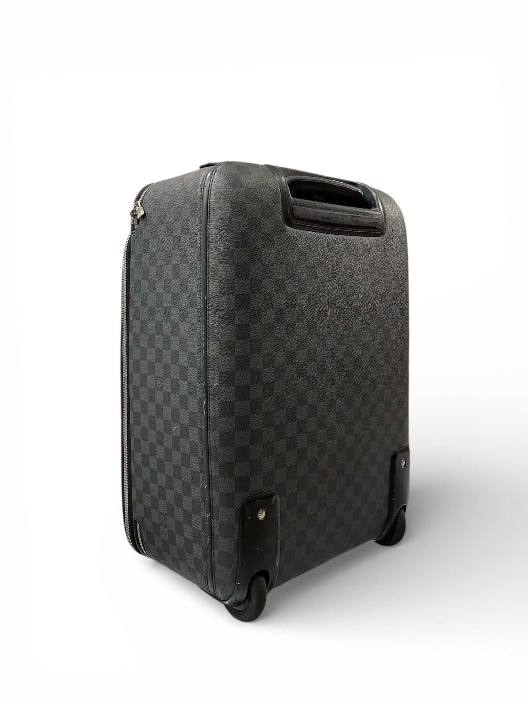 Louis Vuitton - Gray travel suitcase