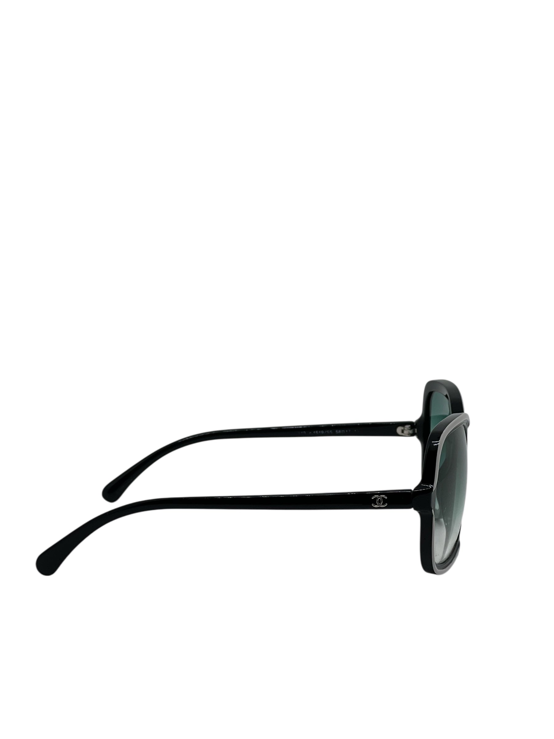 Chanel - Lunettes de soleil noir et blanche