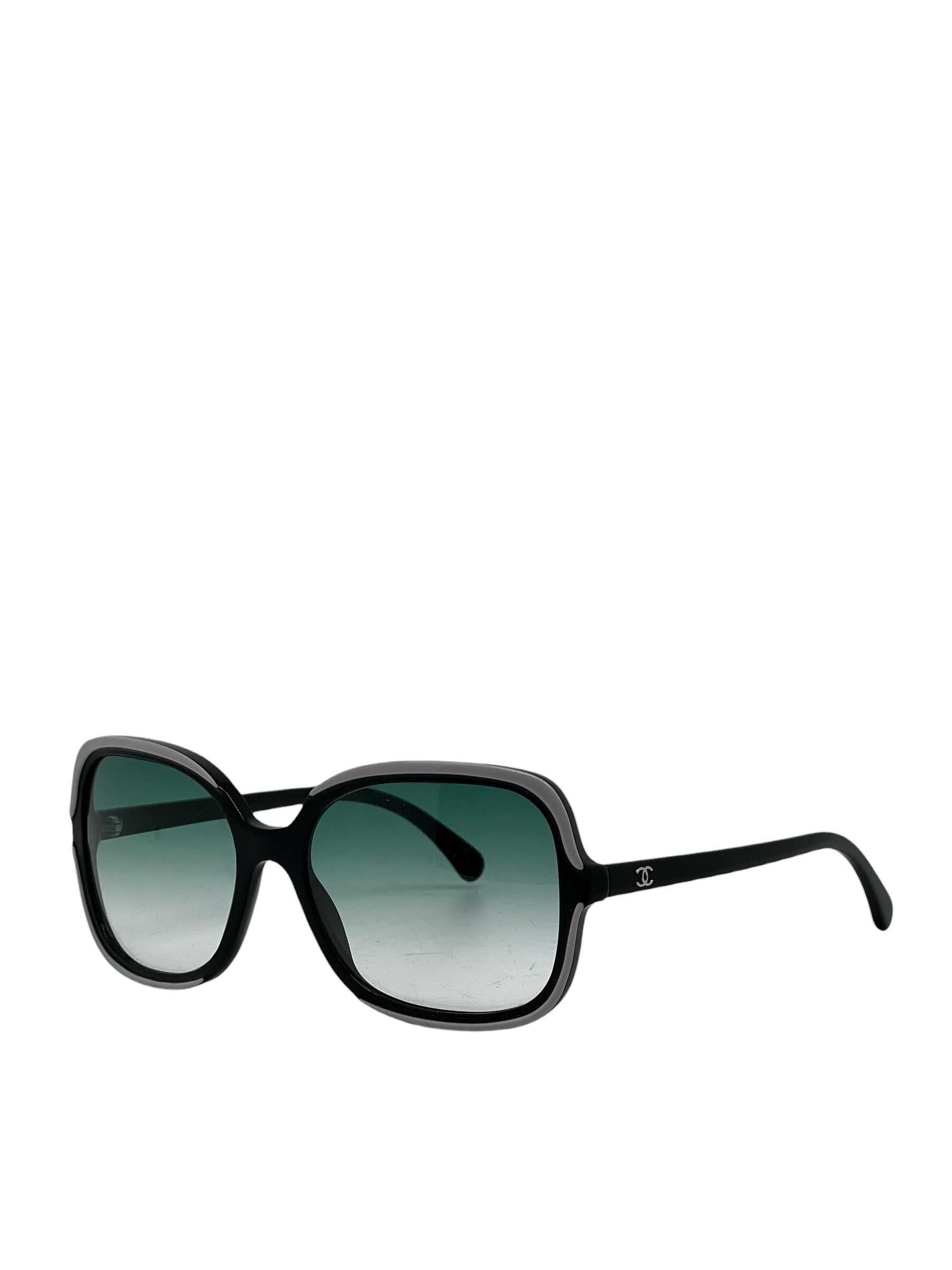 Chanel - Lunettes de soleil noir et blanche