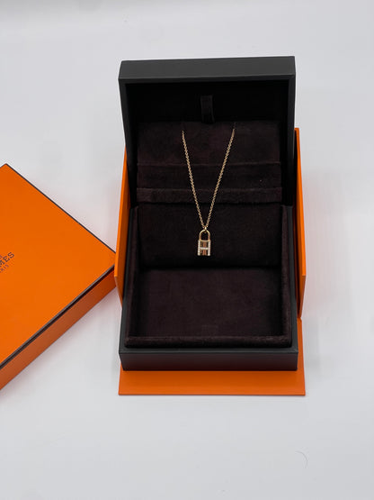 Hermès - Kelly padlock pendant in pink gold and diamonds