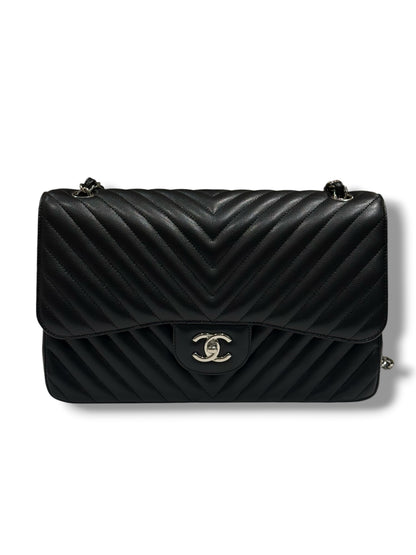Chanel - Sac Jumbo noir cuir caviar chevron